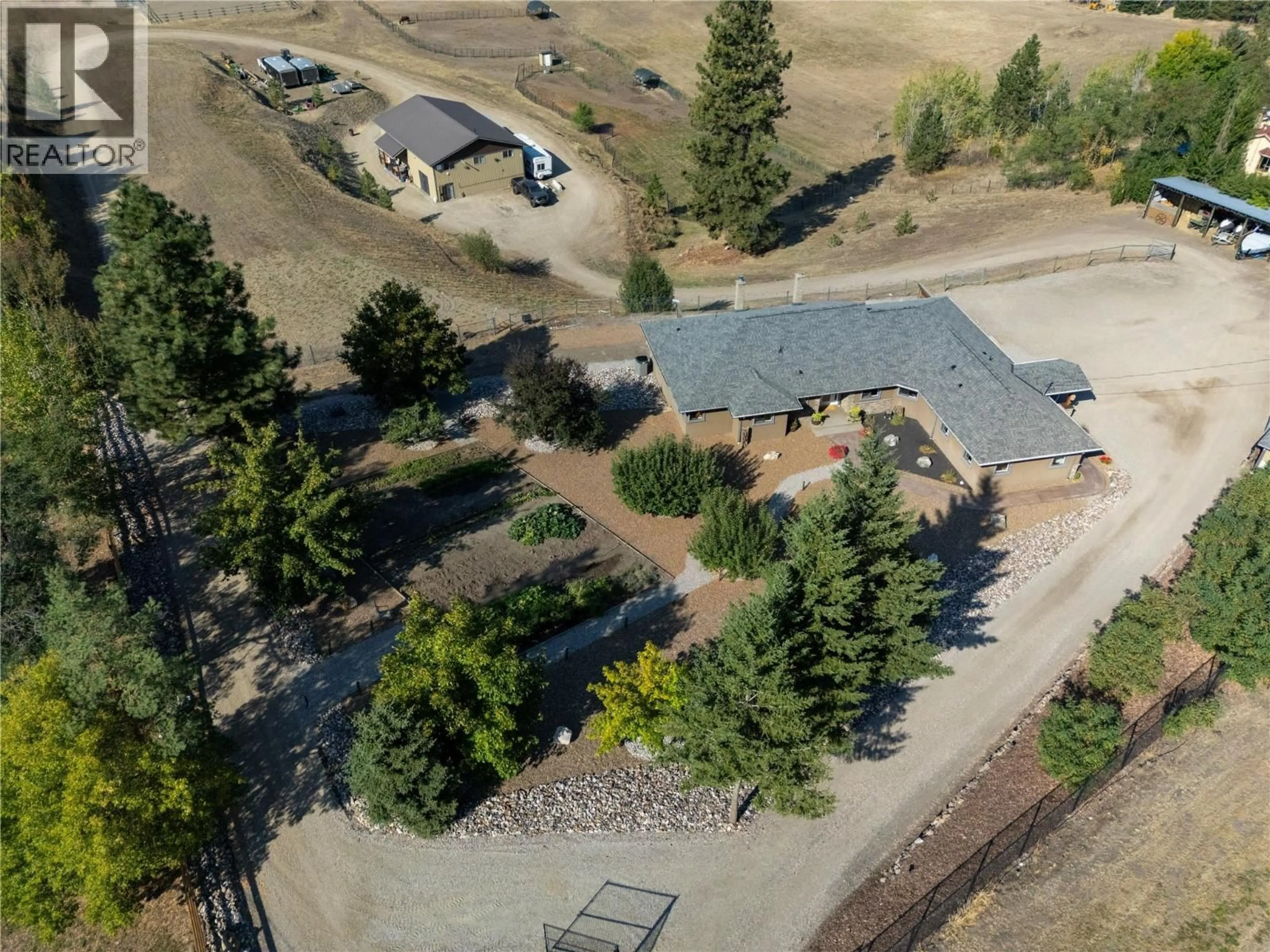 A pic from outside/outdoor area/front of a property/back of a property/a pic from drone, unknown for 1258 ROUND LAKE ROAD, Spallumcheen British Columbia V0E1B5