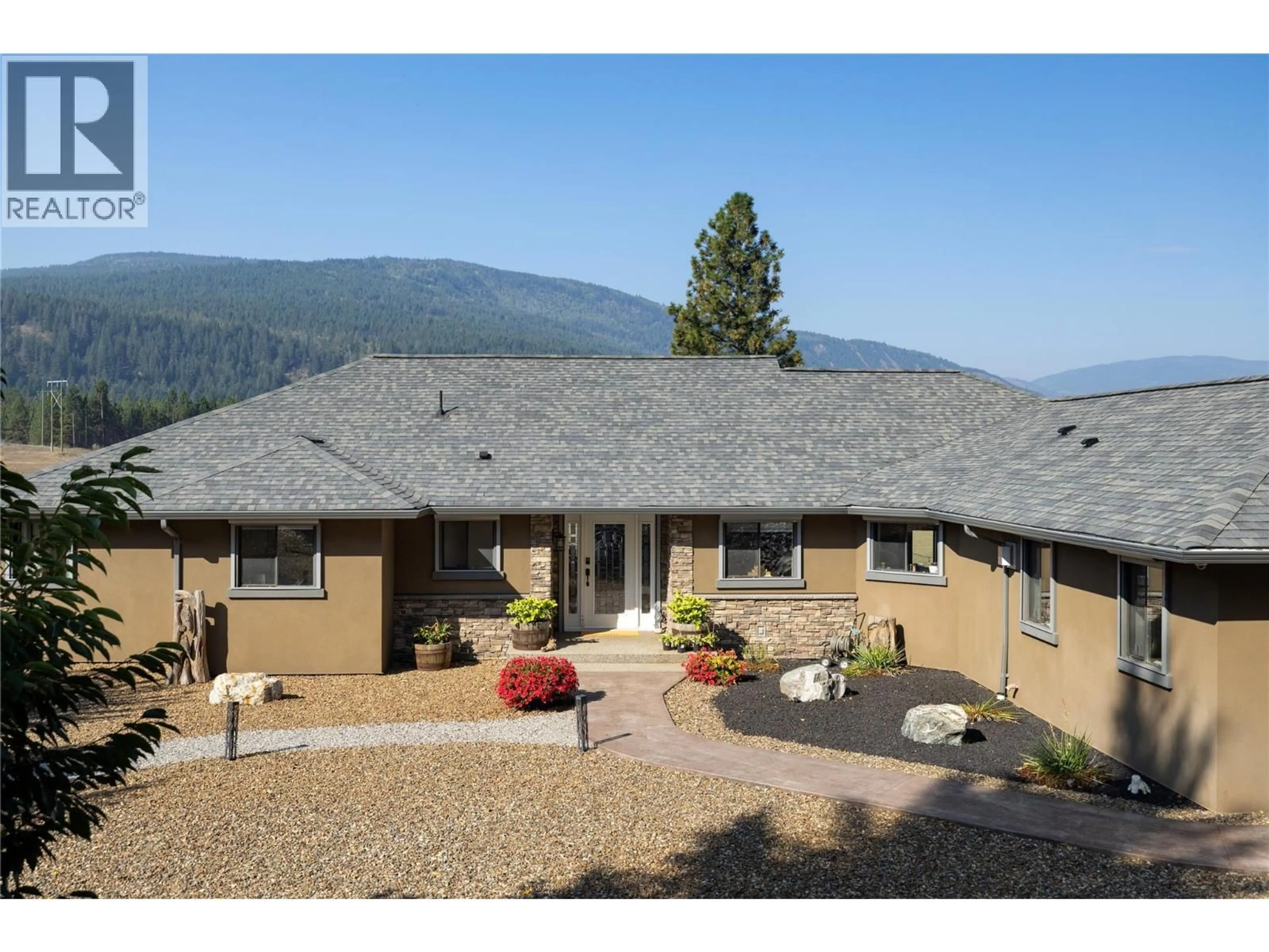 Home with vinyl exterior material, mountain view for 1258 ROUND LAKE ROAD, Spallumcheen British Columbia V0E1B5