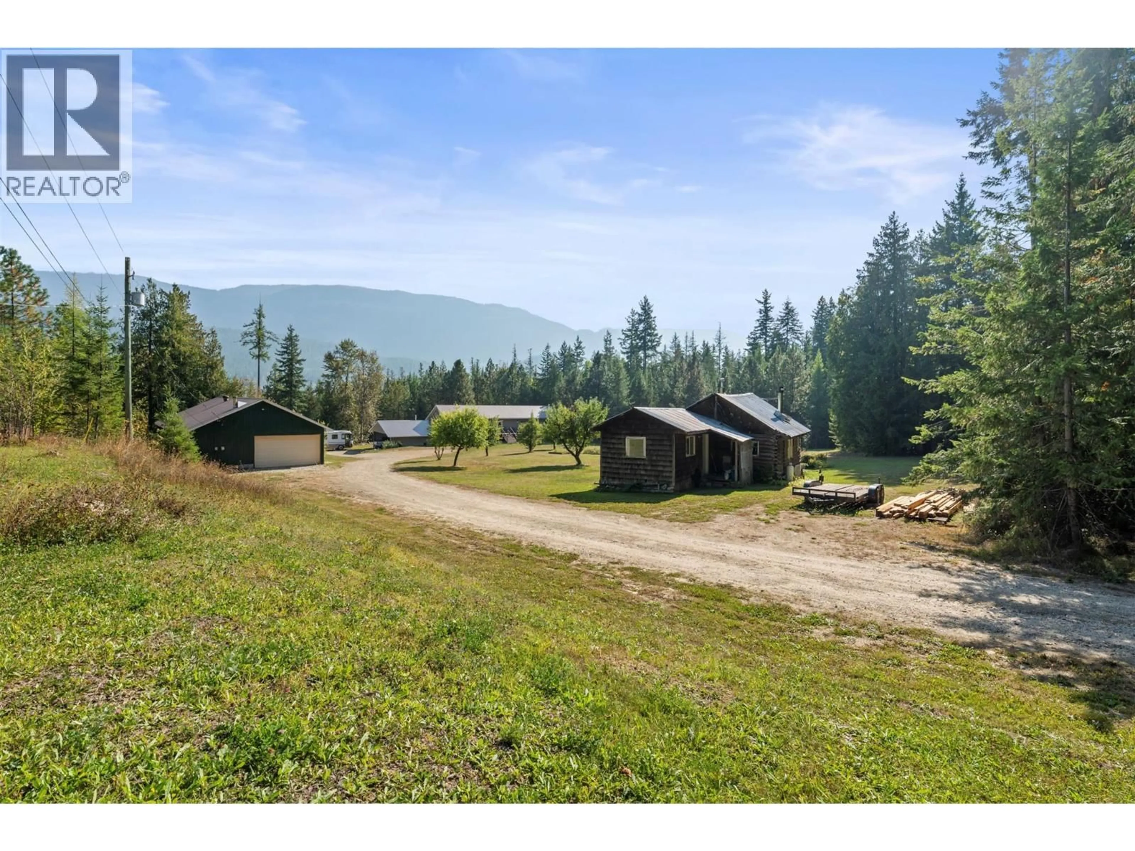 A pic from outside/outdoor area/front of a property/back of a property/a pic from drone, mountain view for 2510 SAMUELSON ROAD, Sicamous British Columbia V0E2V5