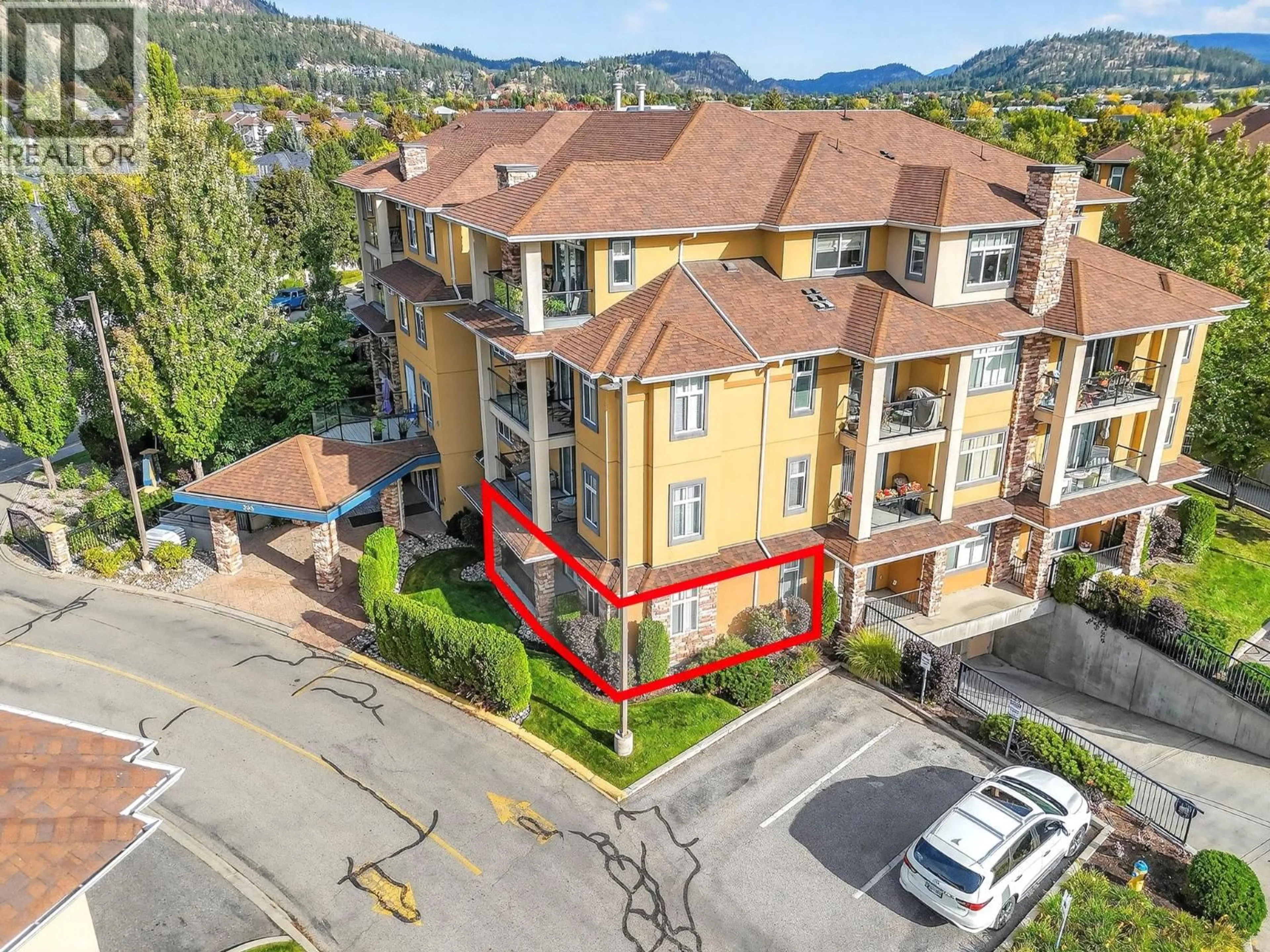 A pic from outside/outdoor area/front of a property/back of a property/a pic from drone, mountain view for 102 - 305 WHITMAN ROAD, Kelowna British Columbia V1V2P3