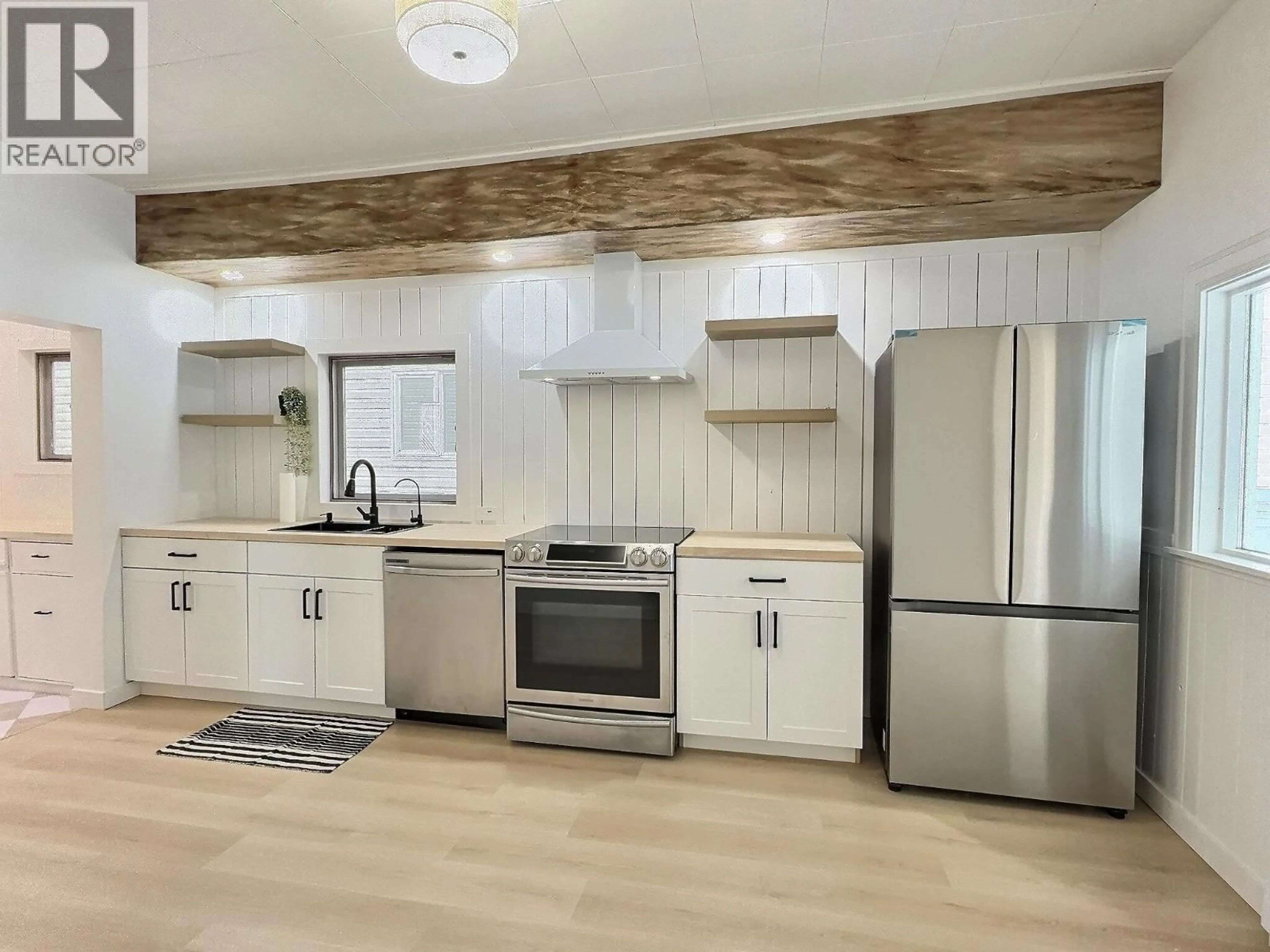 Open concept kitchen, wood/laminate floor for 730 OKANAGAN AVENUE, Chase British Columbia V0E1M0