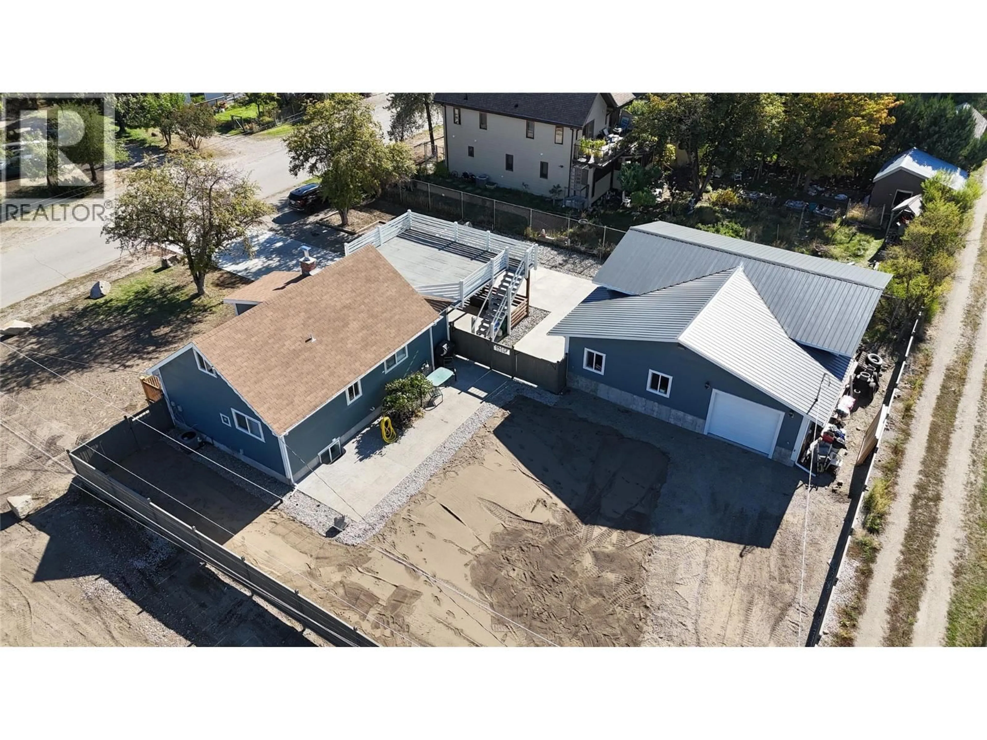 A pic from outside/outdoor area/front of a property/back of a property/a pic from drone, street for 7689 21ST STREET, Grand Forks British Columbia V0H1H2
