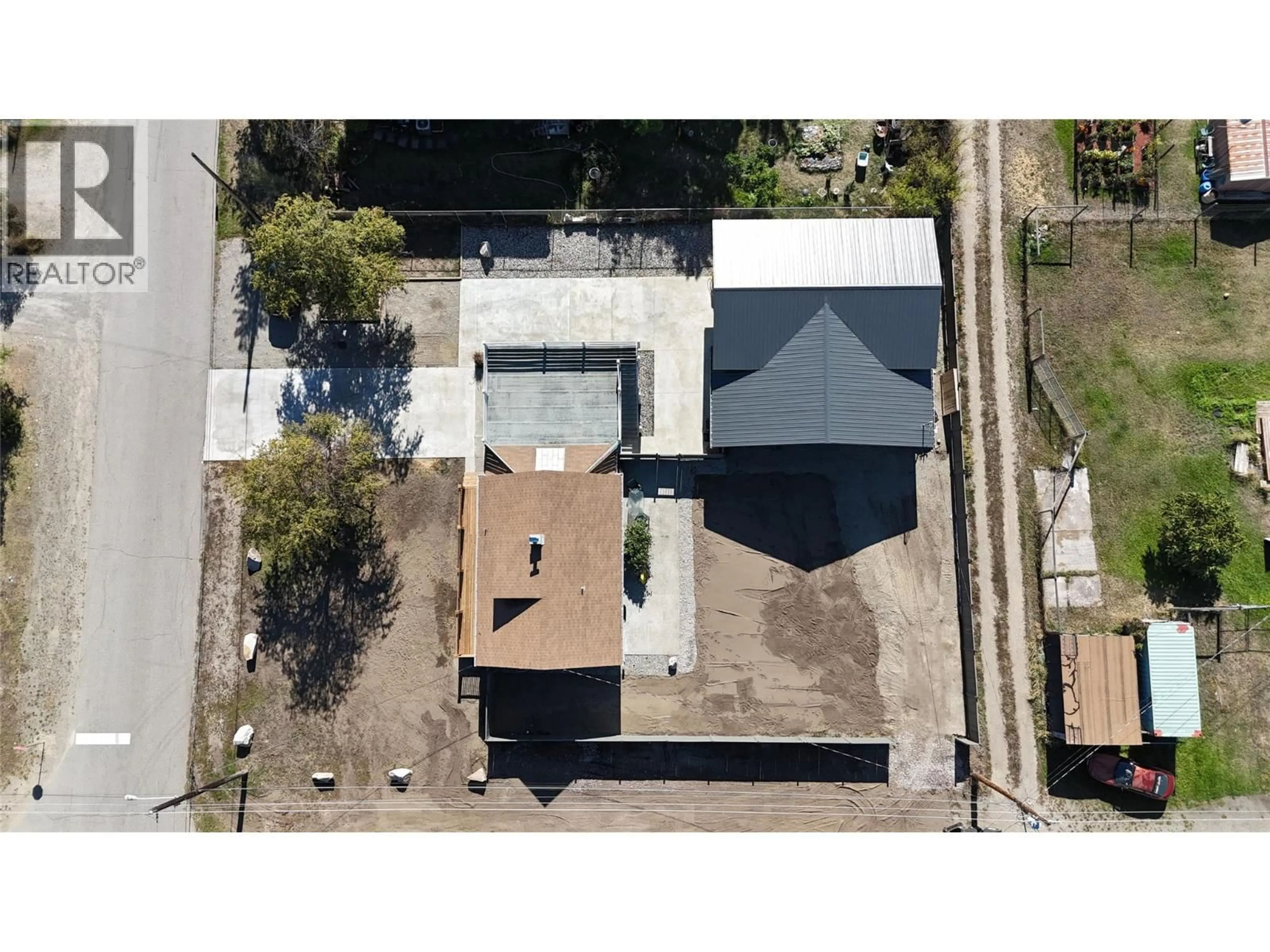 A pic from outside/outdoor area/front of a property/back of a property/a pic from drone, street for 7689 21ST STREET, Grand Forks British Columbia V0H1H2