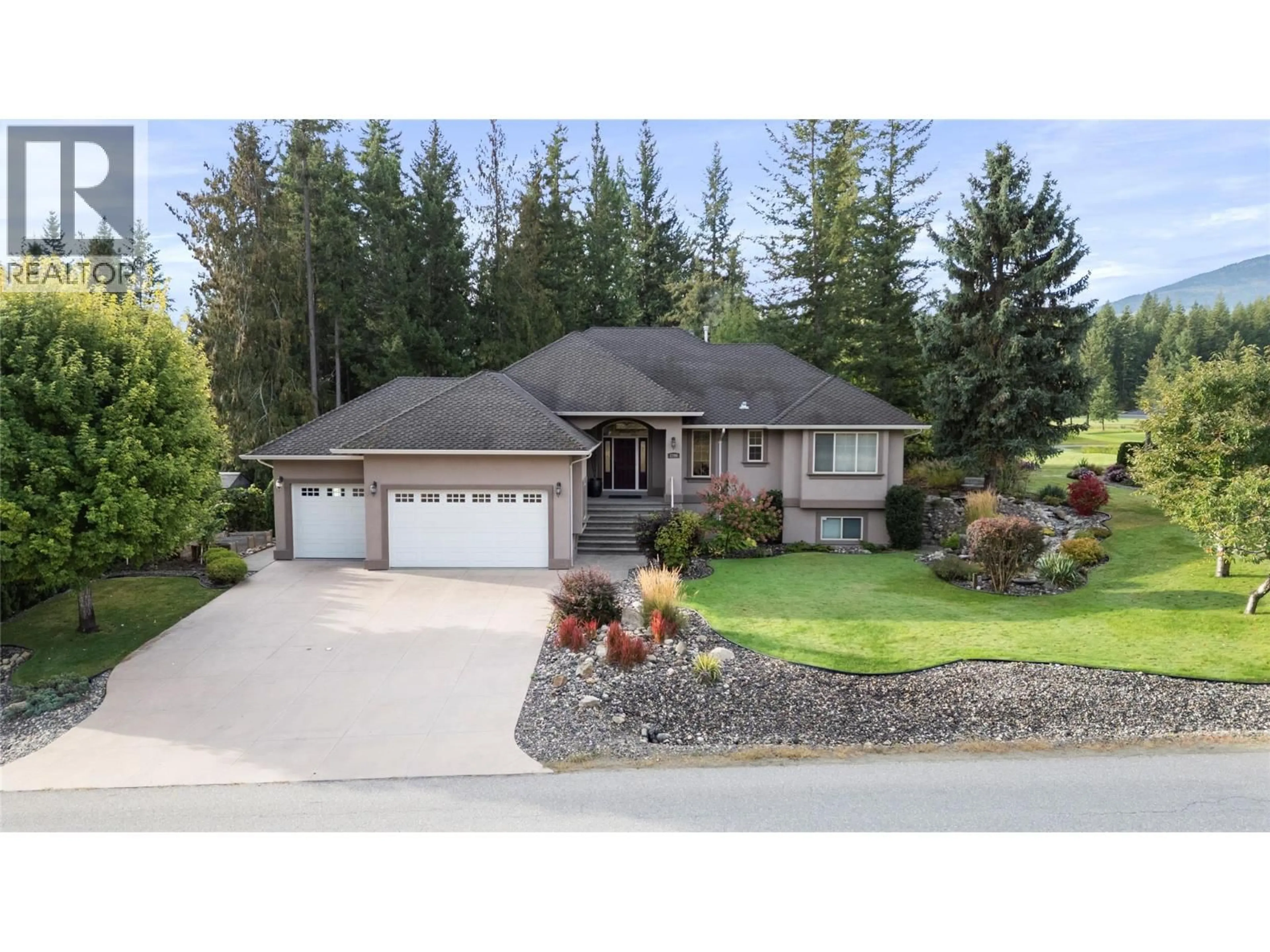 Home with vinyl exterior material, street for 2706 GOLF COURSE DRIVE, Blind Bay British Columbia V0E1H2
