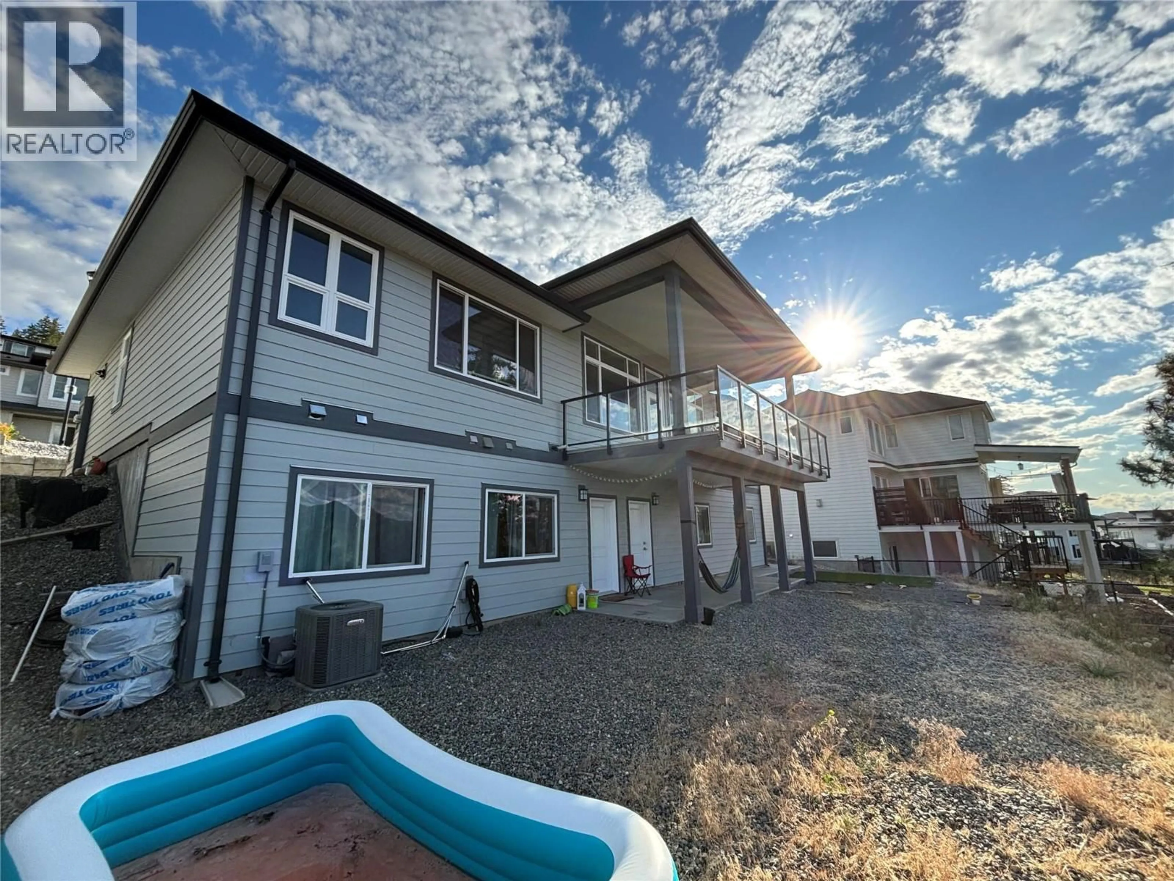 A pic from outside/outdoor area/front of a property/back of a property/a pic from drone, unknown for 1698 BALSAM PLACE, Kamloops British Columbia V2E0E2