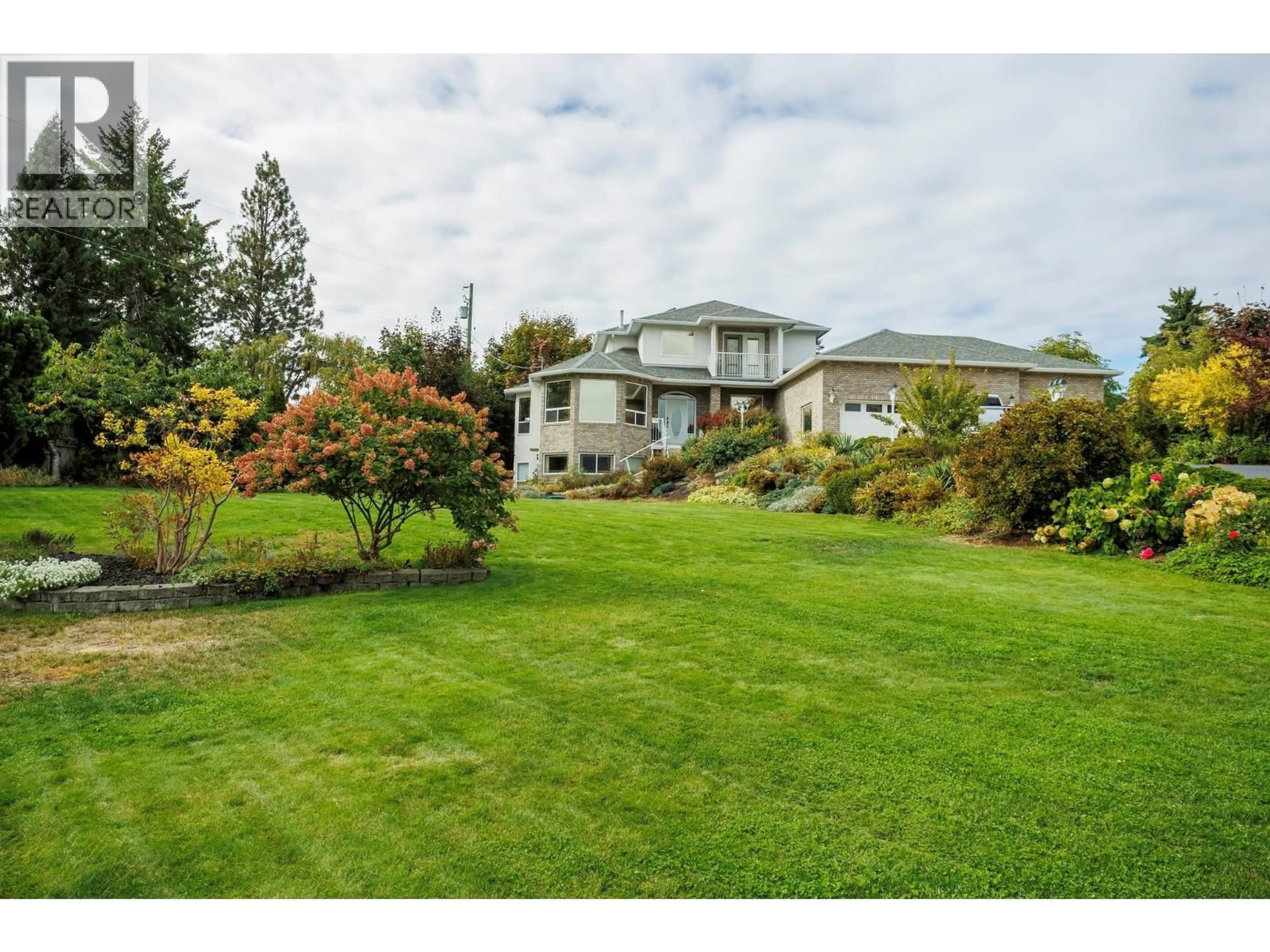 A pic from outside/outdoor area/front of a property/back of a property/a pic from drone, water/lake/river/ocean view for 11310 BOND ROAD, Lake Country British Columbia V4V1J5