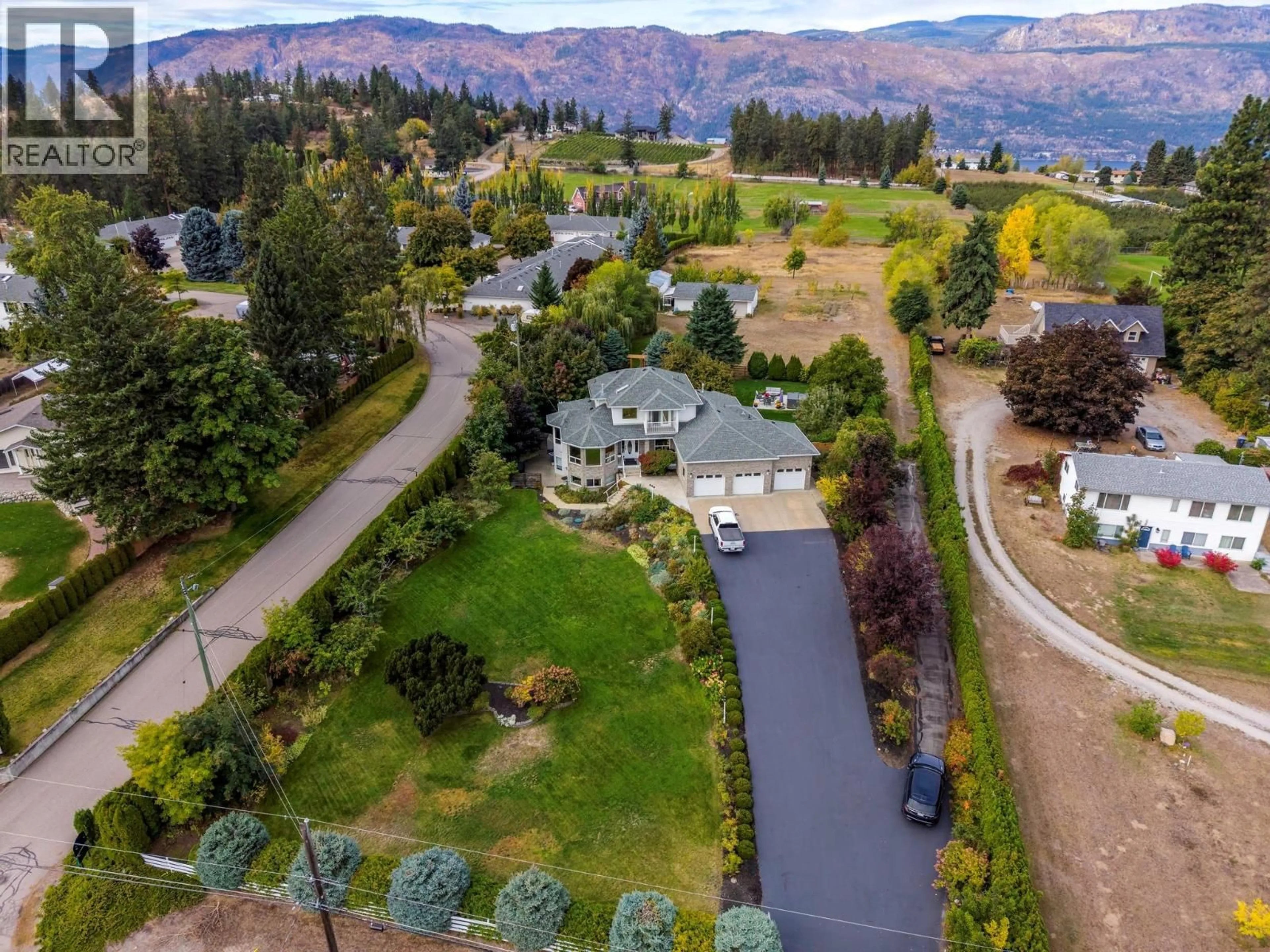 A pic from outside/outdoor area/front of a property/back of a property/a pic from drone, mountain view for 11310 BOND ROAD, Lake Country British Columbia V4V1J5