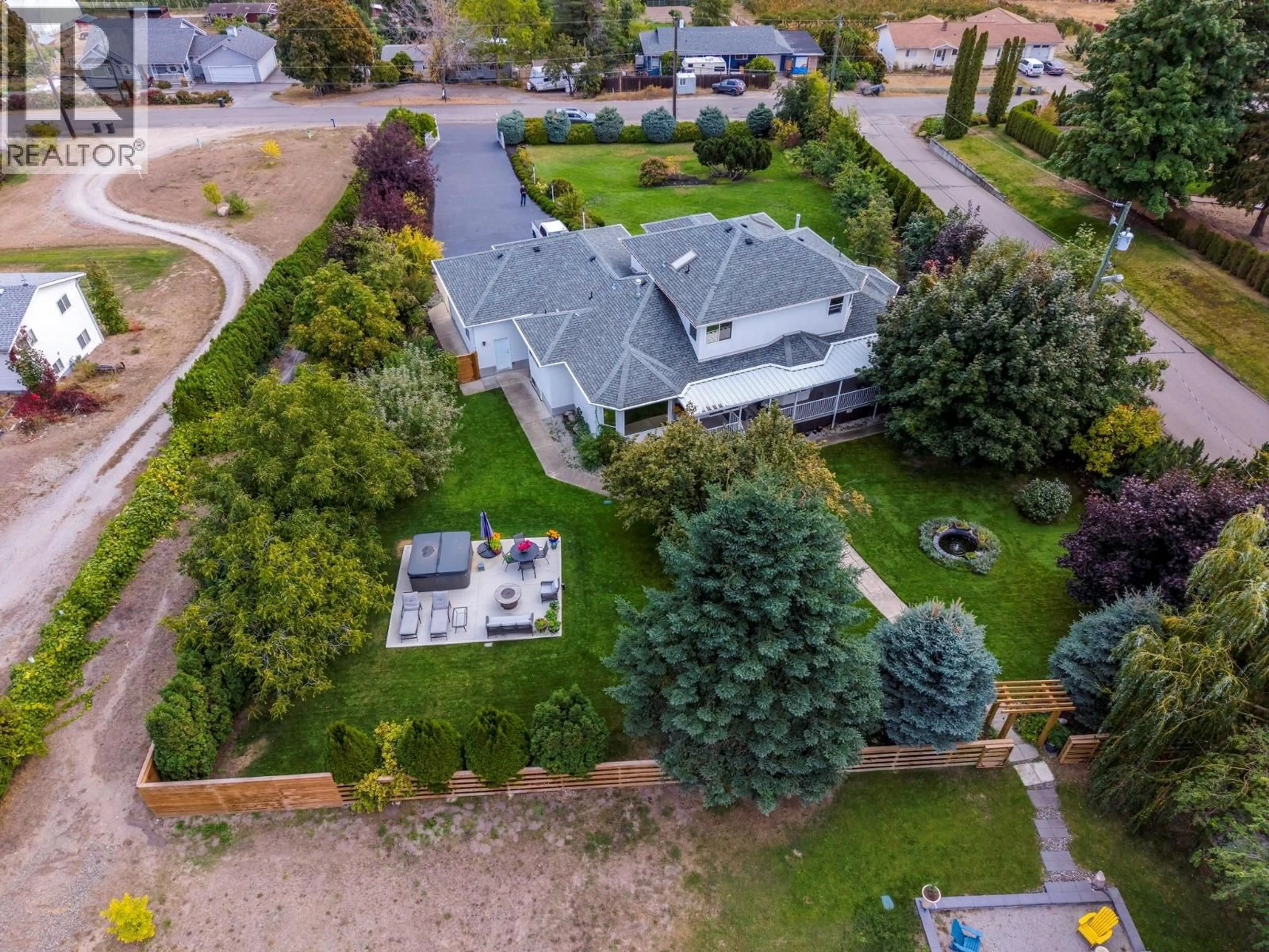 A pic from outside/outdoor area/front of a property/back of a property/a pic from drone, street for 11310 BOND ROAD, Lake Country British Columbia V4V1J5