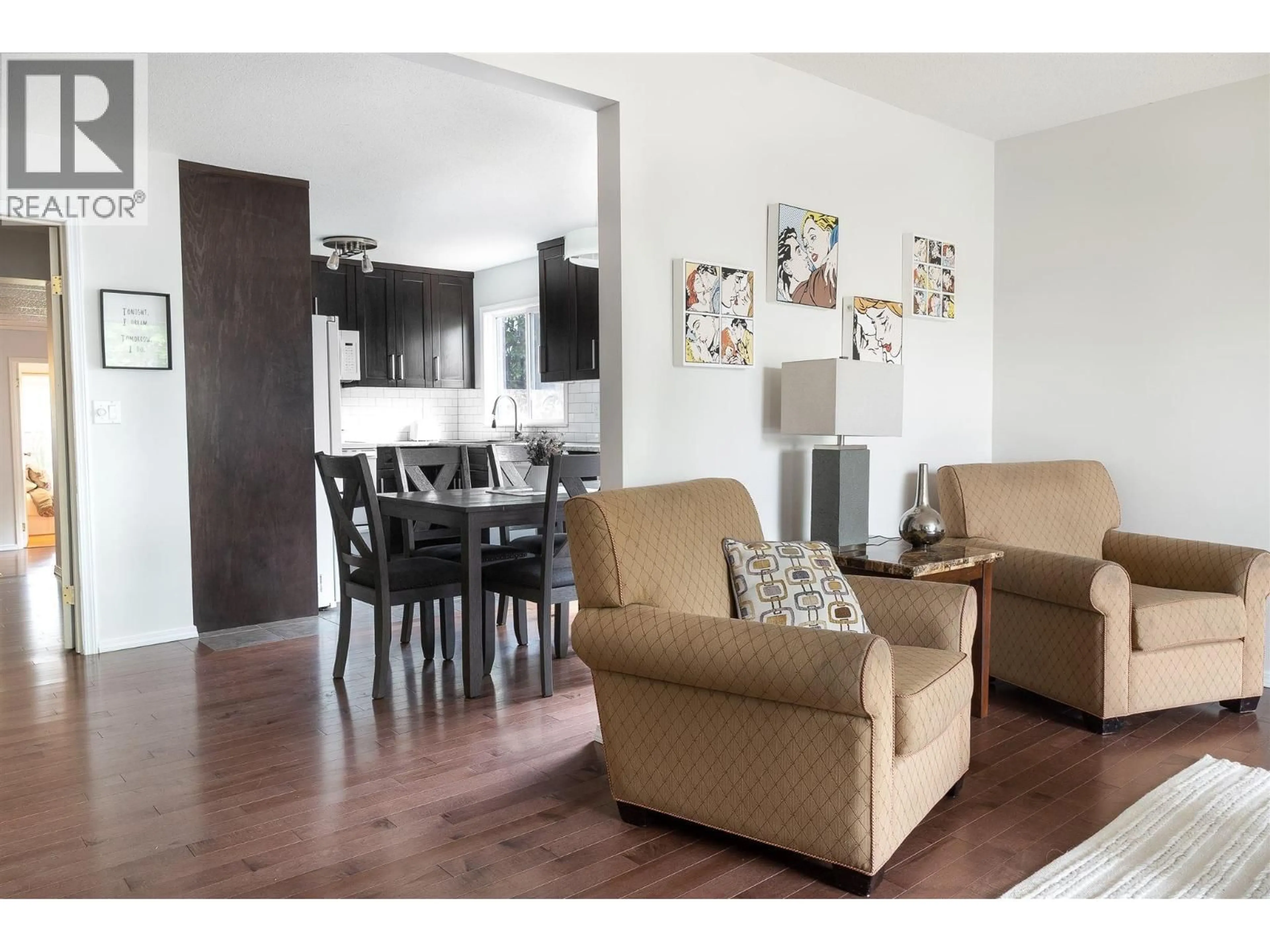 Living room with furniture, wood/laminate floor for 792 DEHART AVENUE, Kelowna British Columbia V1Y6A1