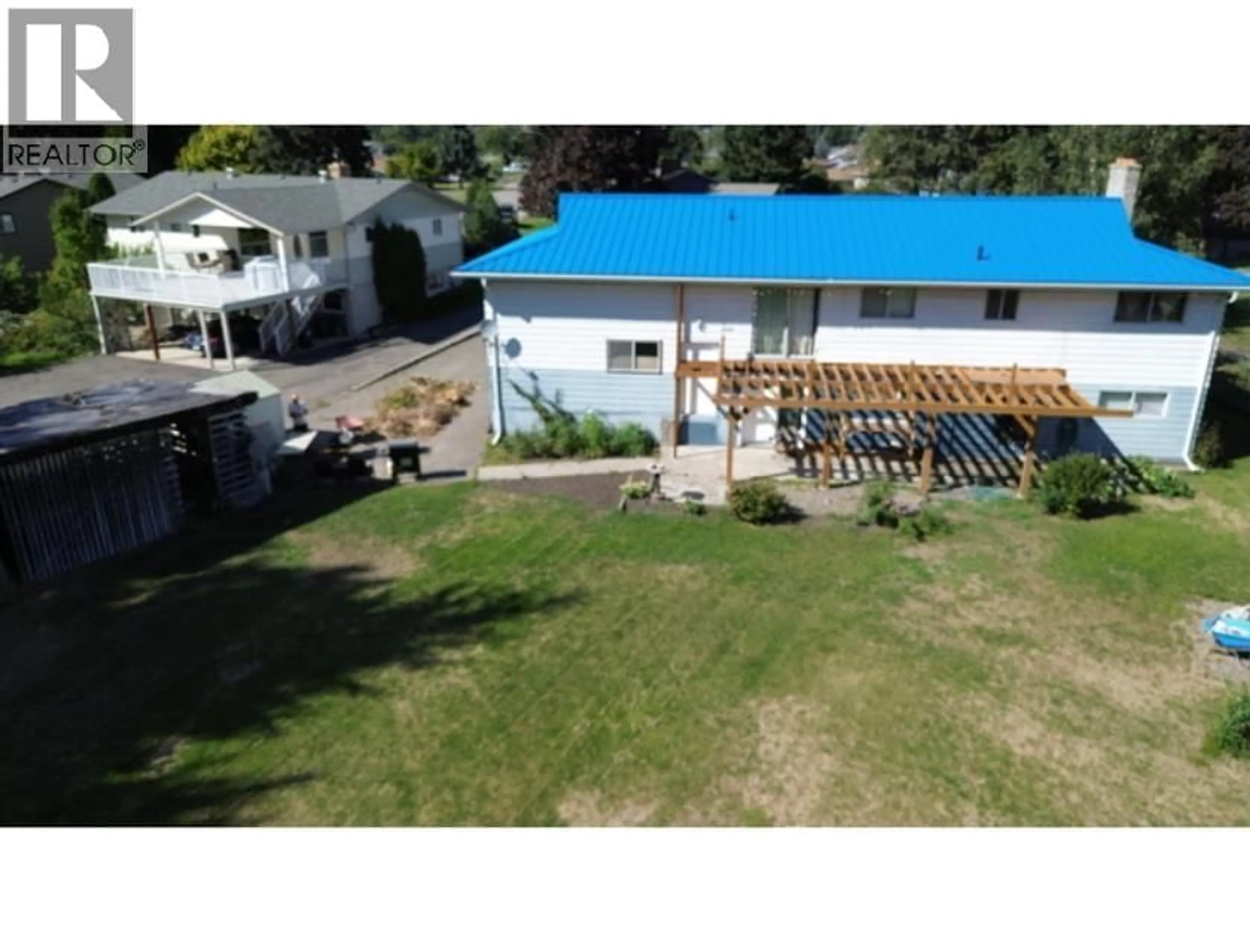 A pic from outside/outdoor area/front of a property/back of a property/a pic from drone, mountain view for 629 THIRD AVENUE, Chase British Columbia V0E1M0