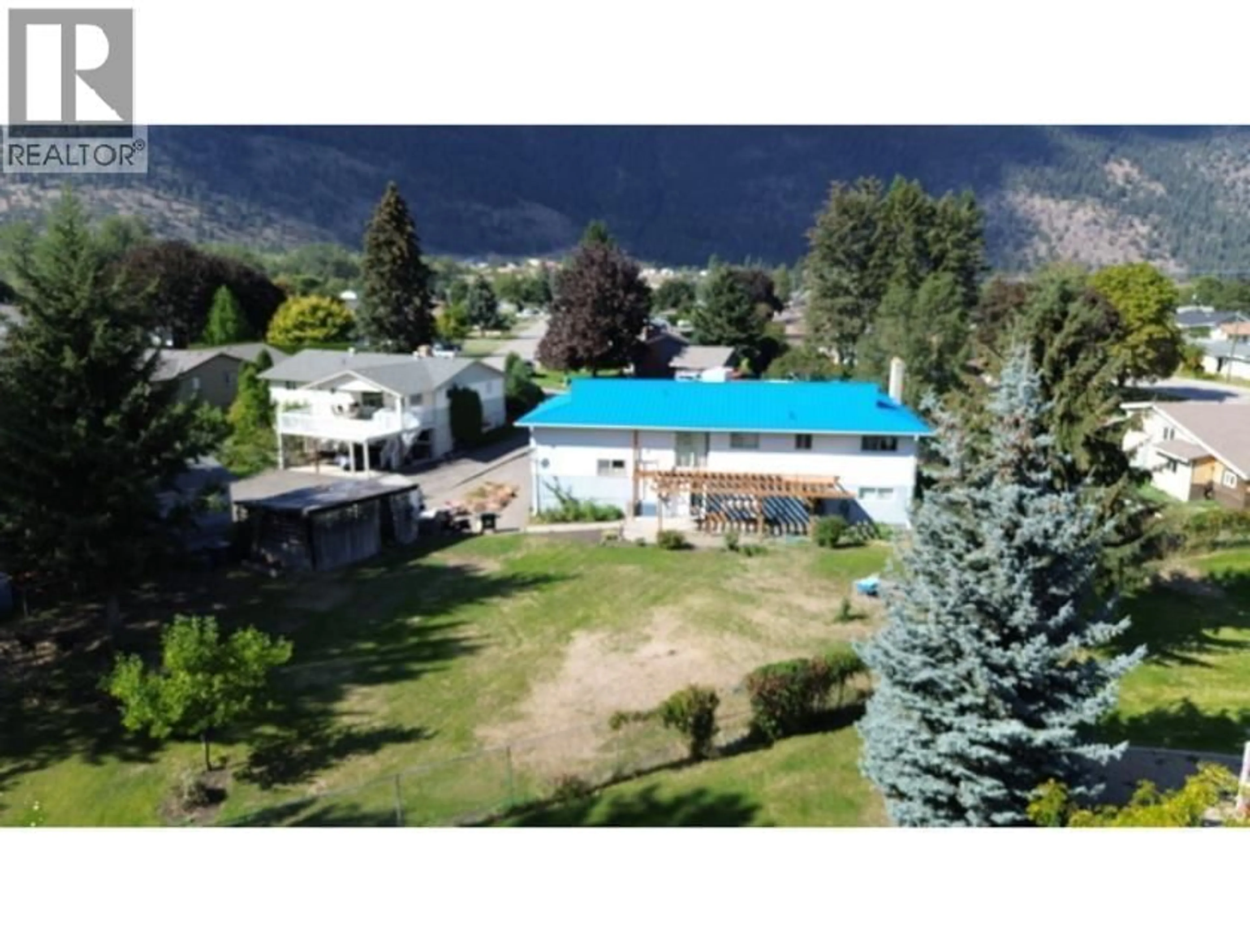A pic from outside/outdoor area/front of a property/back of a property/a pic from drone, mountain view for 629 THIRD AVENUE, Chase British Columbia V0E1M0