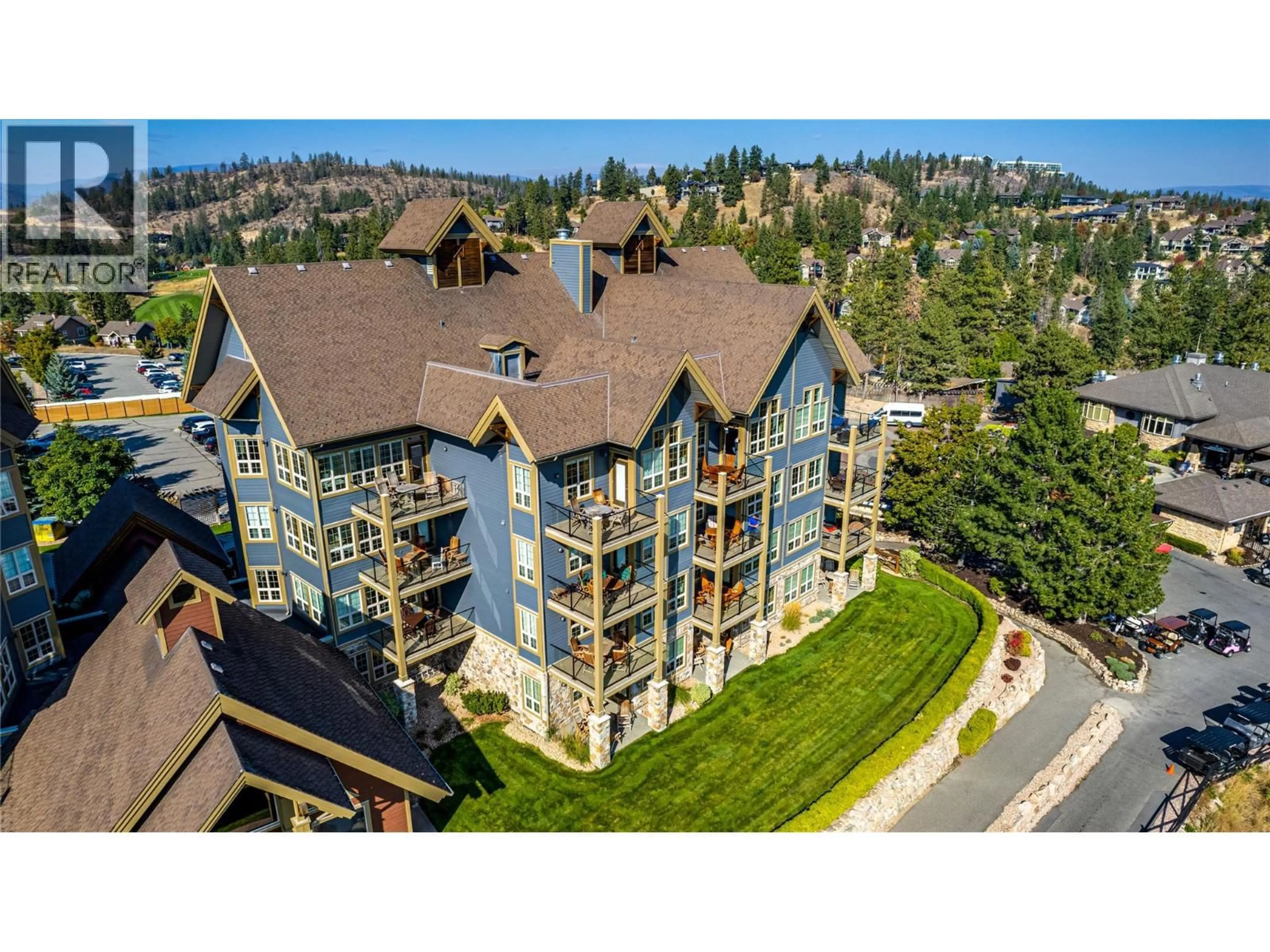 A pic from outside/outdoor area/front of a property/back of a property/a pic from drone, unknown for 414 - 107 VILLAGE CENTRE COURT, Vernon British Columbia V1H1Y8