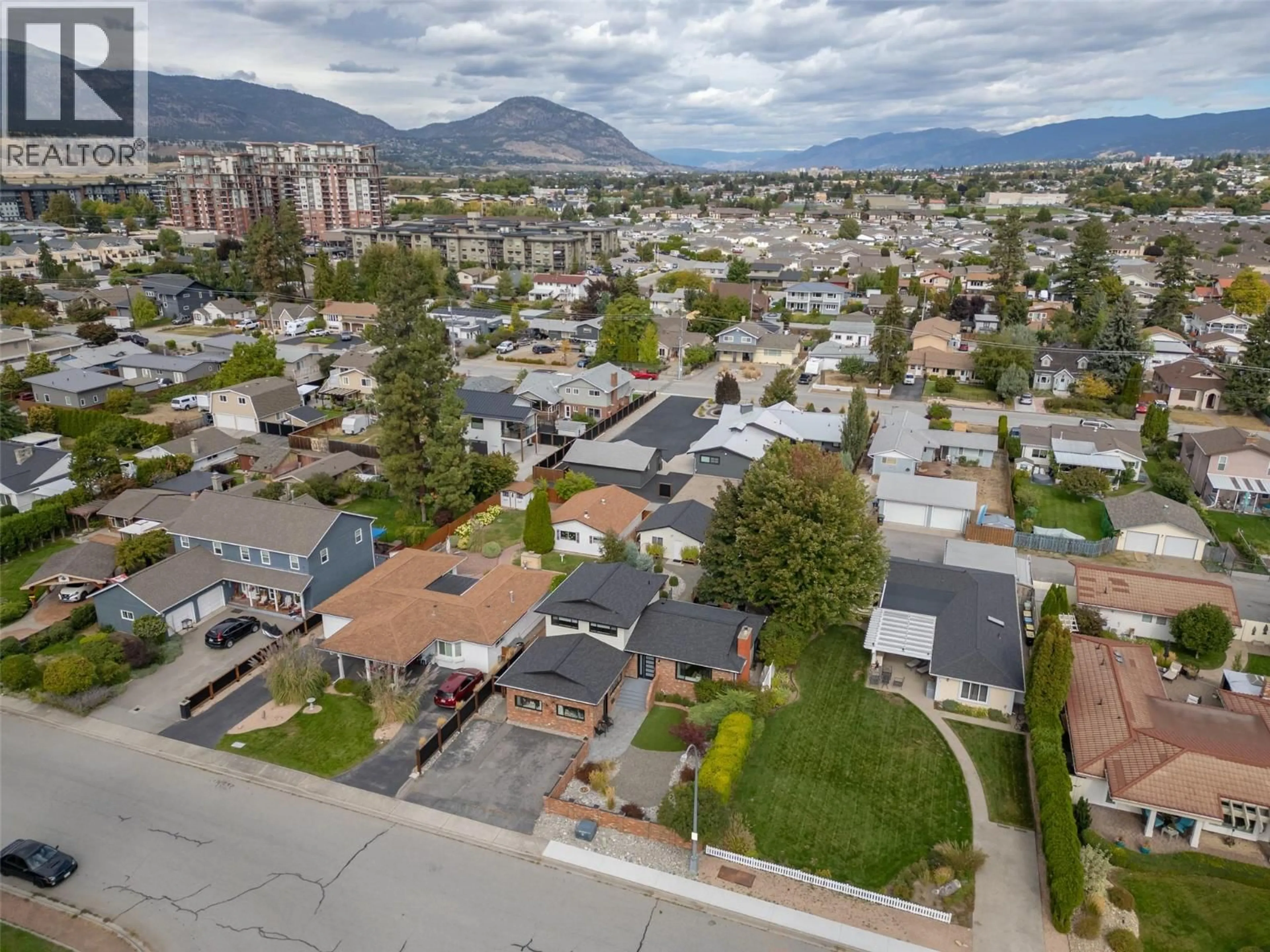 A pic from outside/outdoor area/front of a property/back of a property/a pic from drone, mountain view for 127 ELM AVENUE, Penticton British Columbia V2A3W1