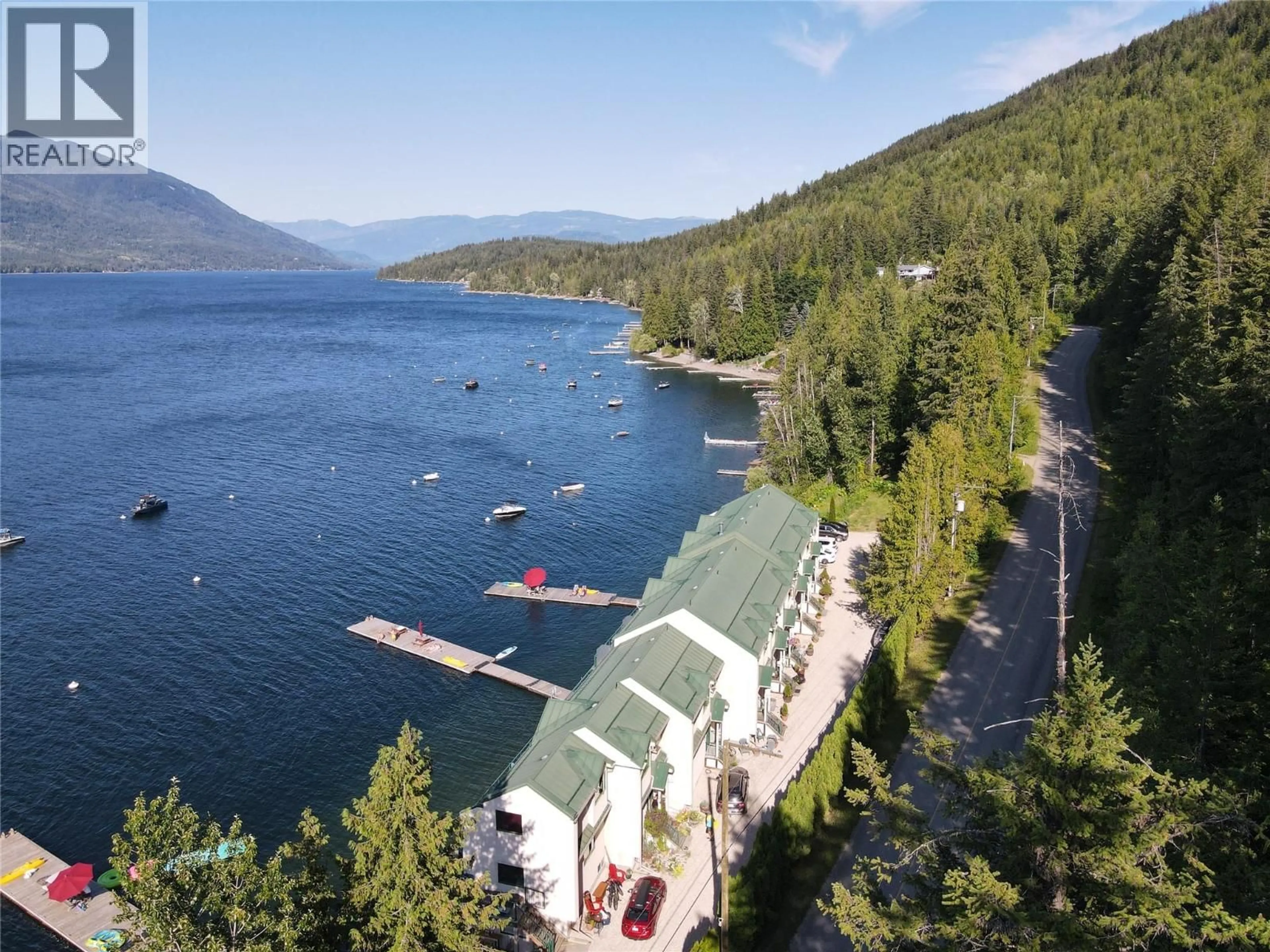 A pic from outside/outdoor area/front of a property/back of a property/a pic from drone, water/lake/river/ocean view for 1 - 3935 EAGLE BAY RD. ROAD, Eagle Bay British Columbia V0E1T0