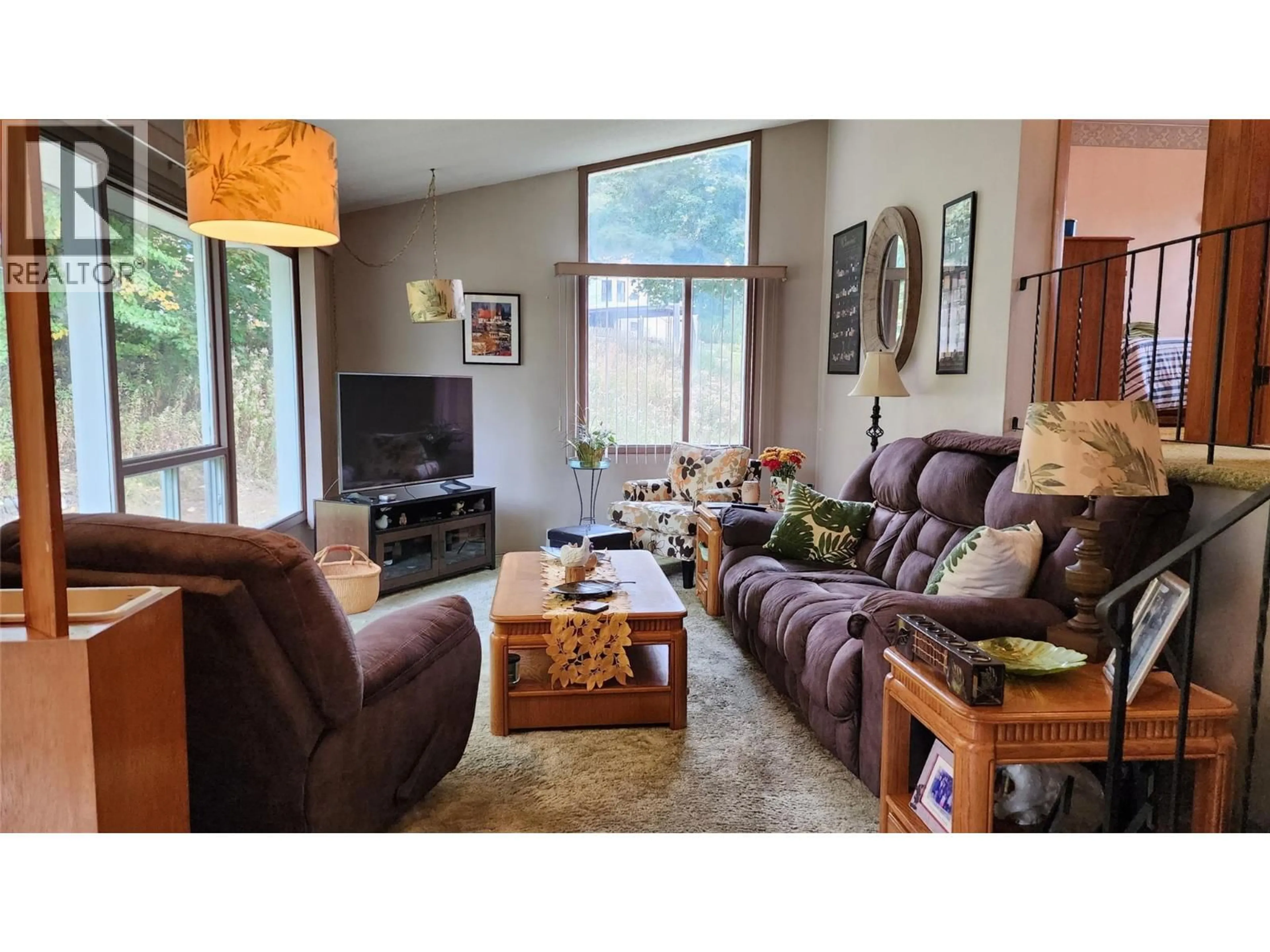 Living room with furniture, wood/laminate floor for 2109 THOMPSON AVENUE, Rossland British Columbia V0G1Y0