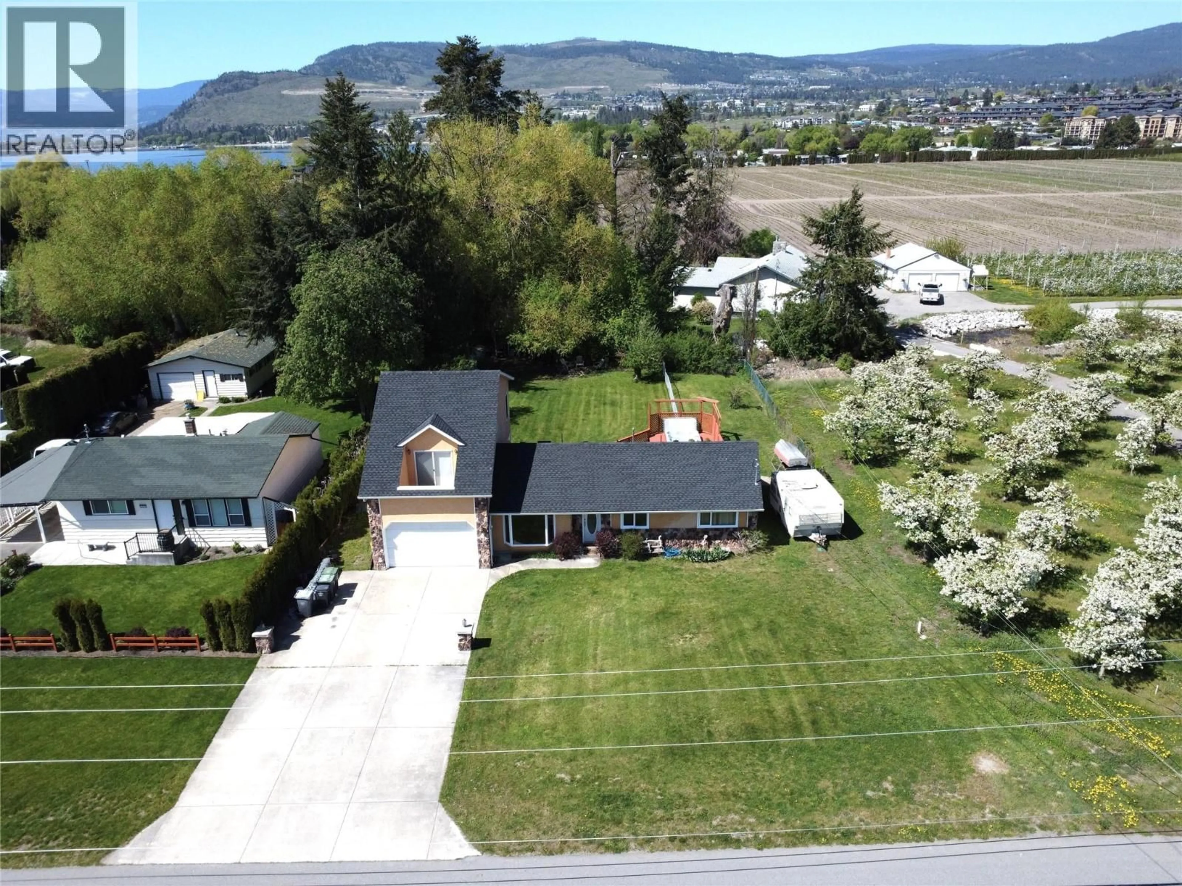 A pic from outside/outdoor area/front of a property/back of a property/a pic from drone, water/lake/river/ocean view for 3982 HITCHNER ROAD, West Kelowna British Columbia V4T2C9