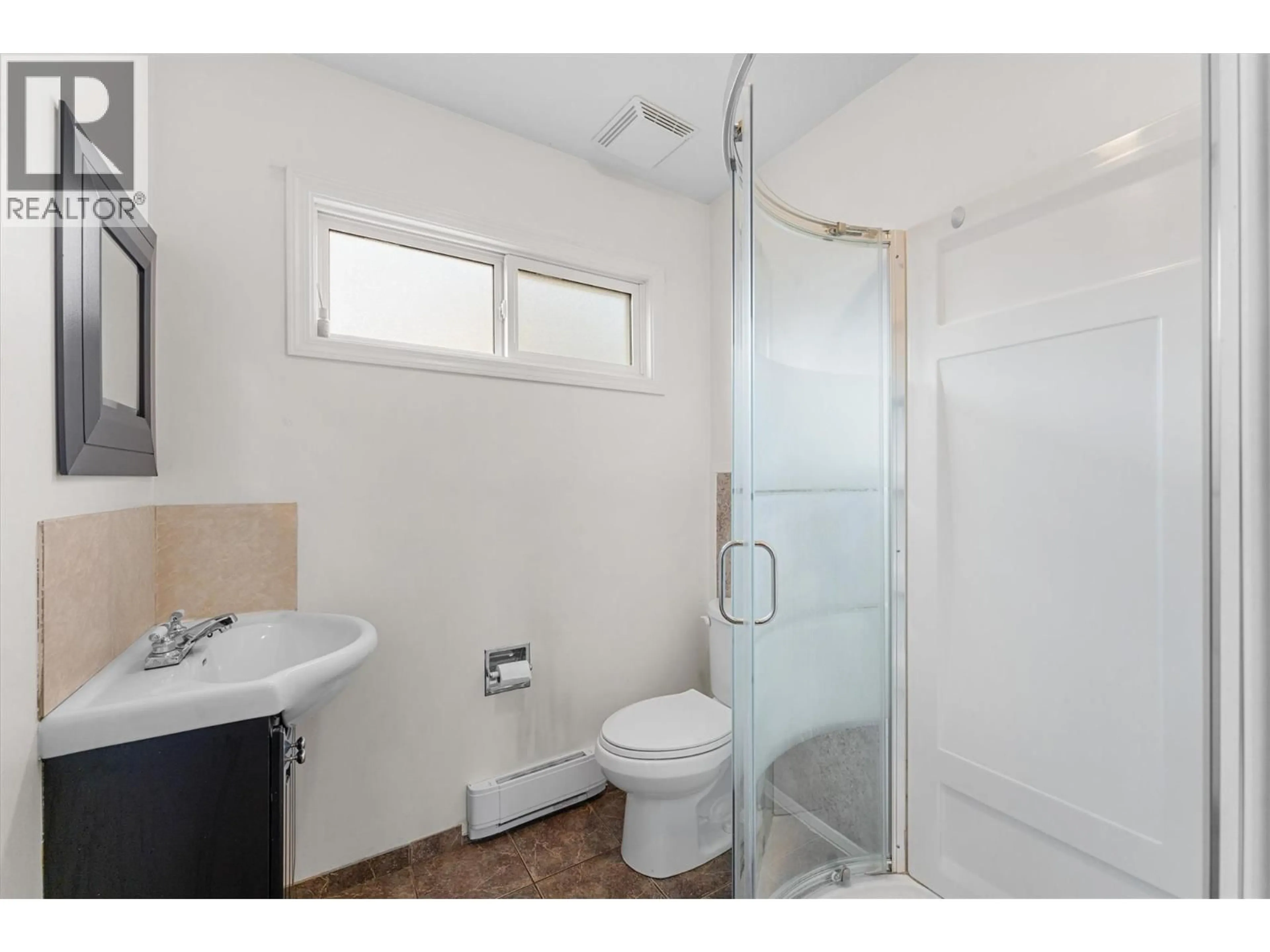Standard bathroom, ceramic/tile floor for 22 - 1985 BURTCH ROAD, Kelowna British Columbia V1Y4B4