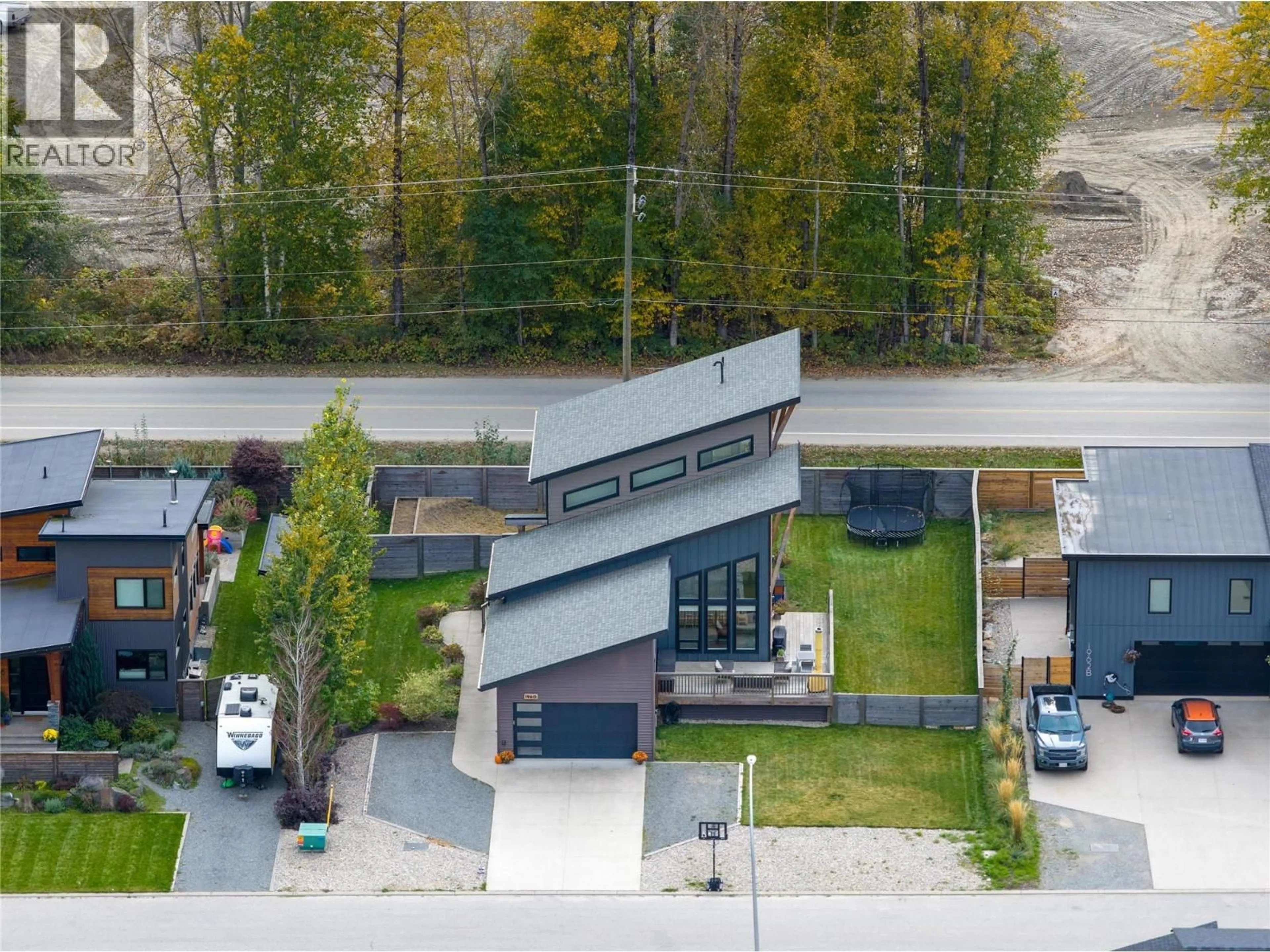 A pic from outside/outdoor area/front of a property/back of a property/a pic from drone, street for 1960 ASPEN CRESCENT, Revelstoke British Columbia V0E2S1