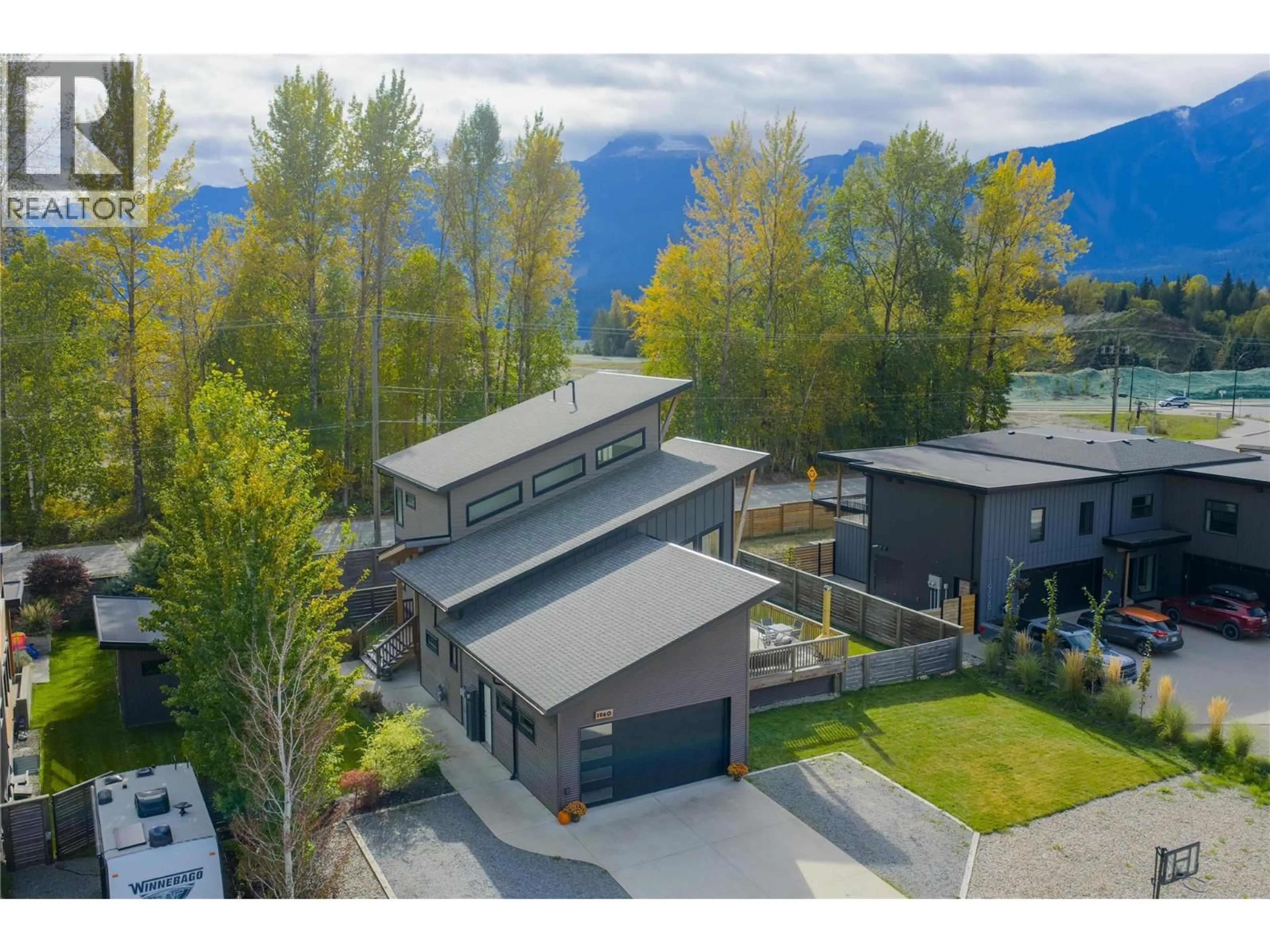 A pic from outside/outdoor area/front of a property/back of a property/a pic from drone, mountain view for 1960 ASPEN CRESCENT, Revelstoke British Columbia V0E2S1
