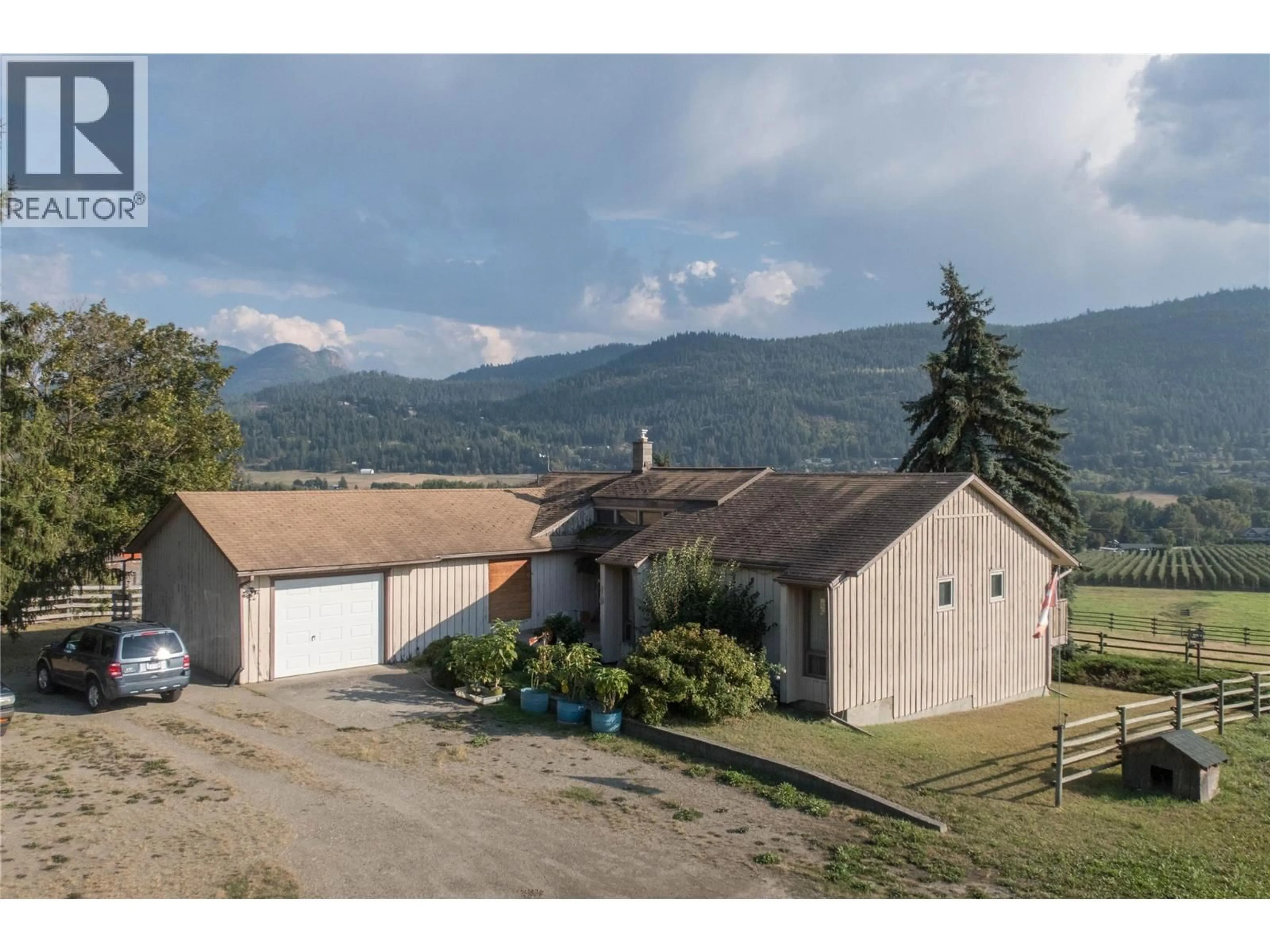 A pic from outside/outdoor area/front of a property/back of a property/a pic from drone, mountain view for 6958 BUCHANAN ROAD, Coldstream British Columbia B1B3C5