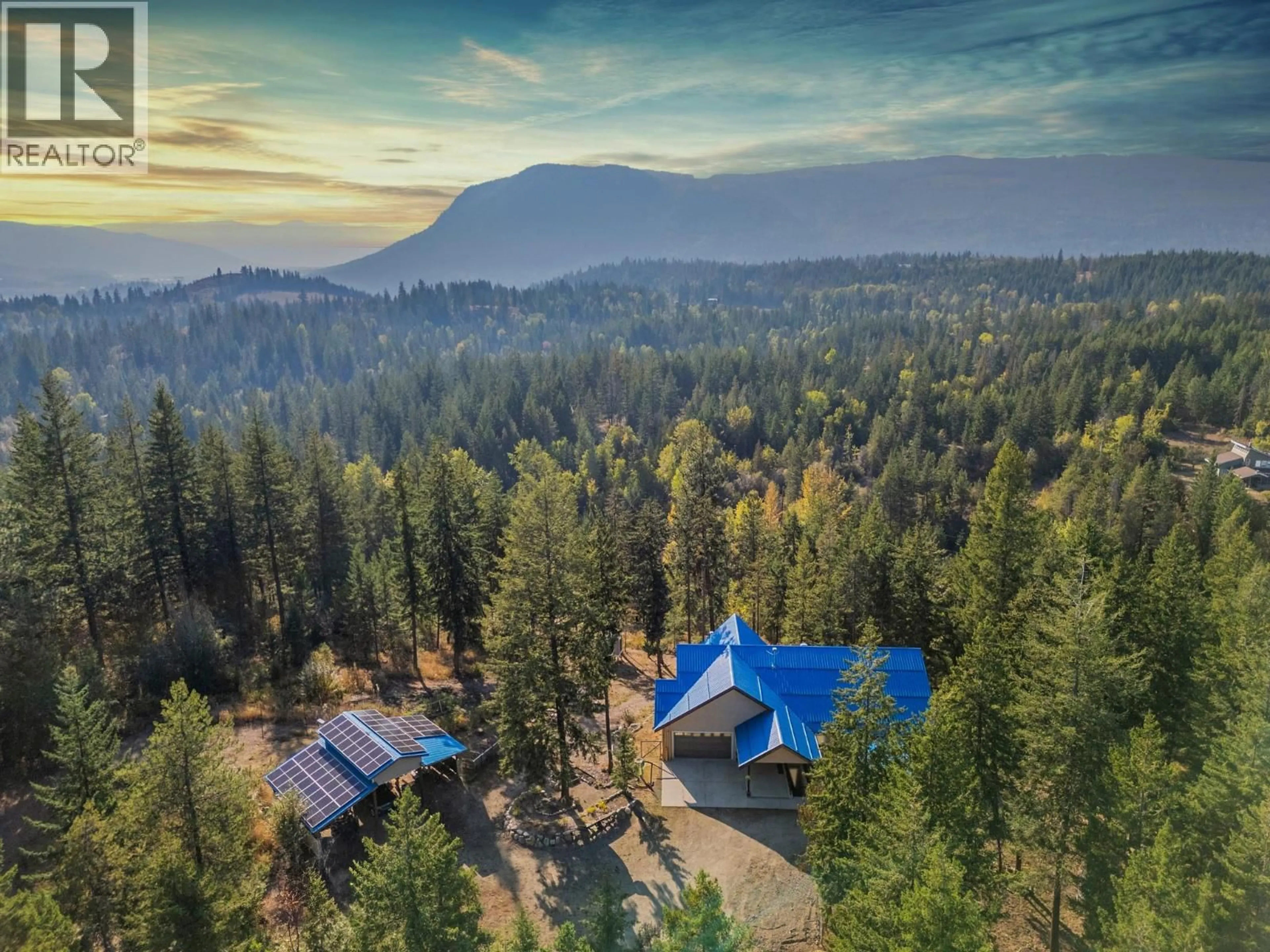 A pic from outside/outdoor area/front of a property/back of a property/a pic from drone, mountain view for 1951 WOLFGANG ROAD, Armstrong British Columbia V4Y0M7