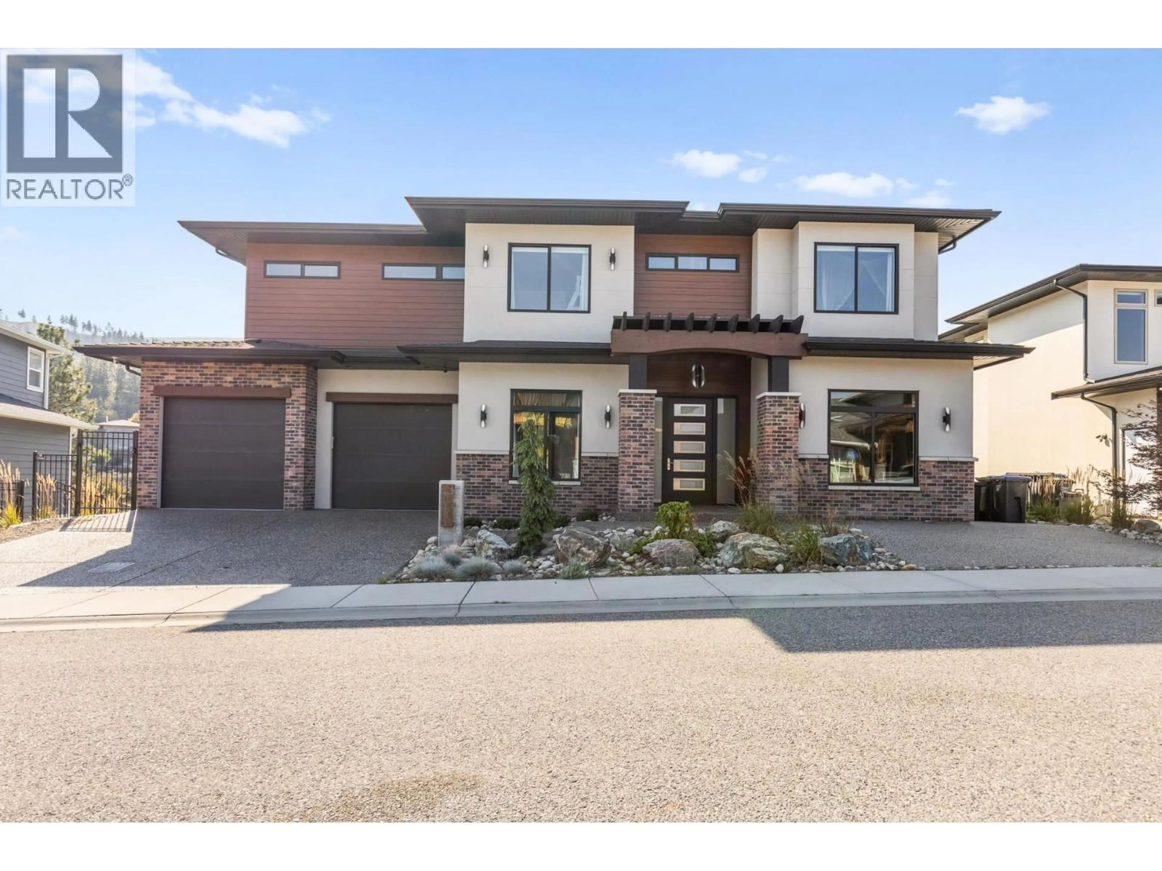 Home with brick exterior material, street for 465 SWAN DRIVE, Kelowna British Columbia V1W5L9
