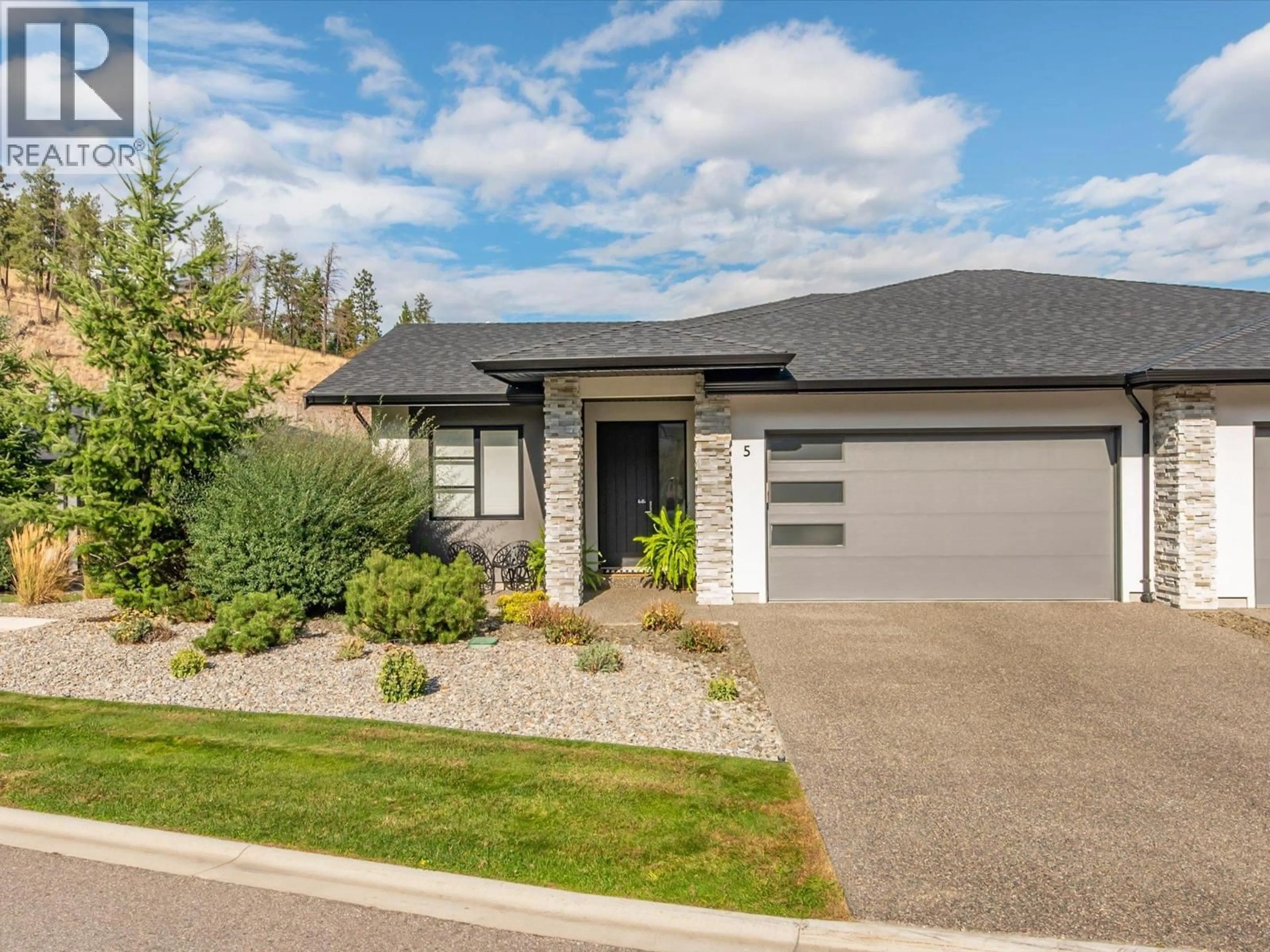 Home with brick exterior material, street for 5 - 1349 ROCKY POINT DRIVE, Kelowna British Columbia V1V0B5