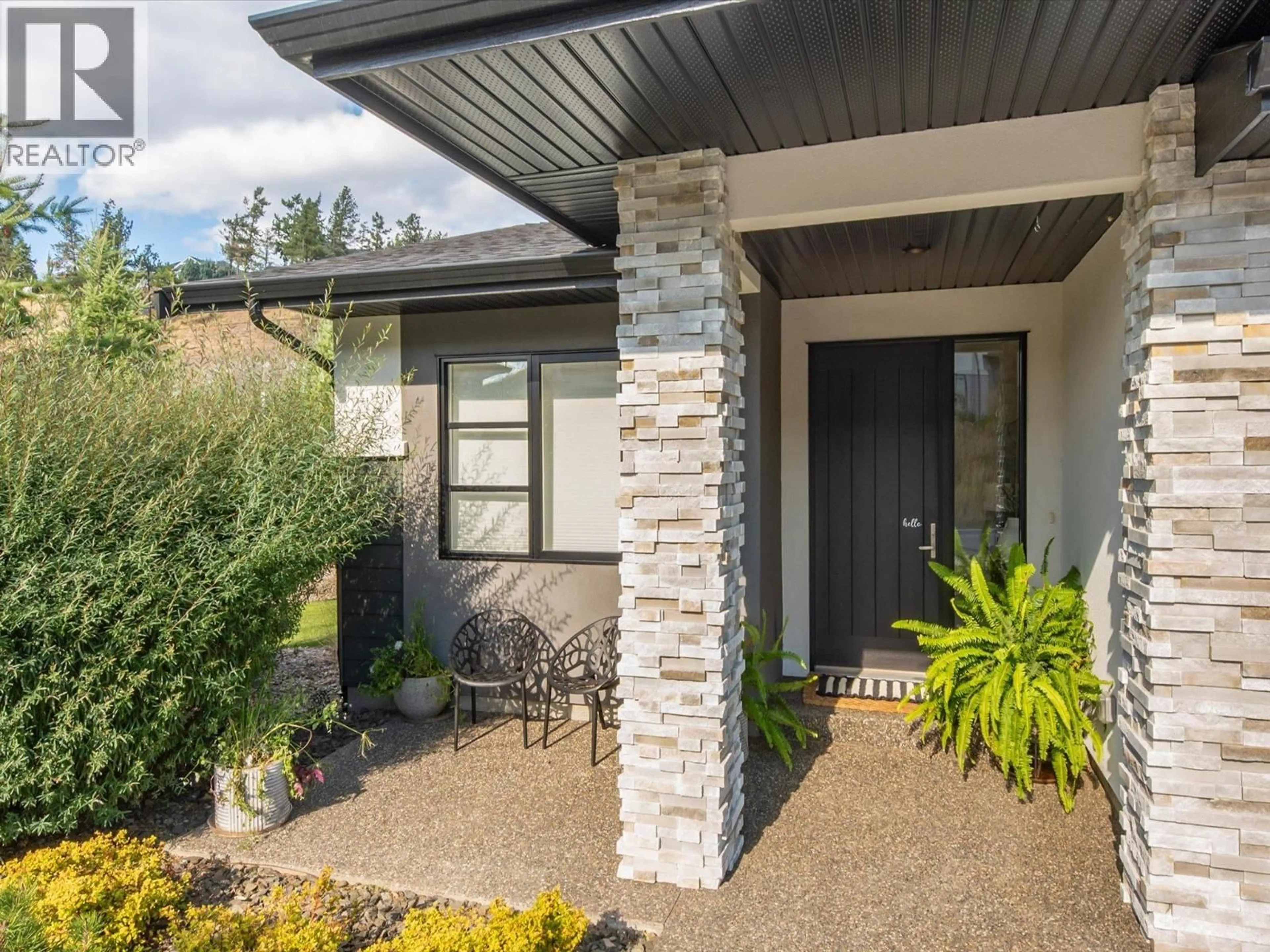 Home with brick exterior material, street for 5 - 1349 ROCKY POINT DRIVE, Kelowna British Columbia V1V0B5