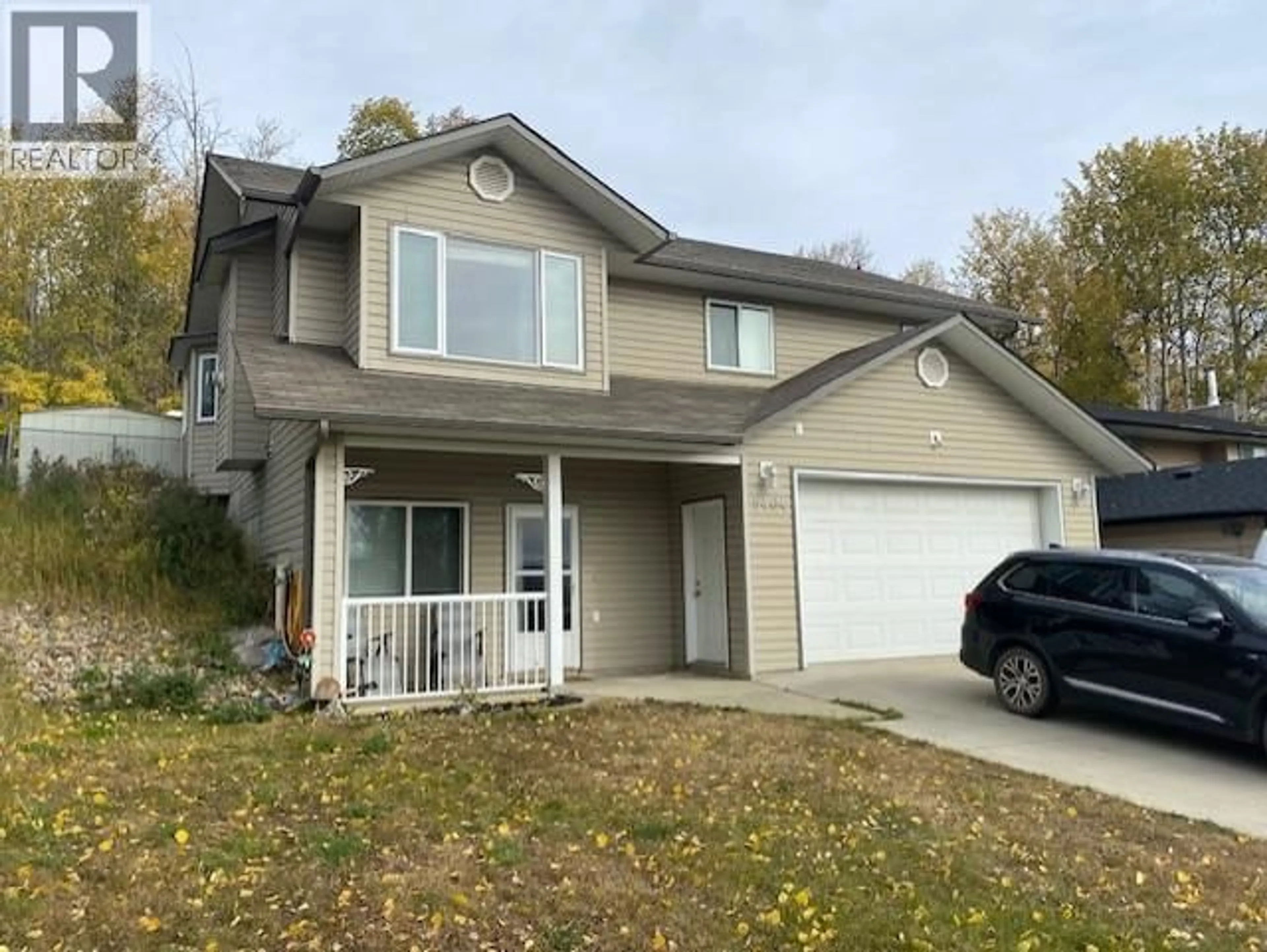 Home with vinyl exterior material, street for 5404 HILLSIDE AVENUE, Chetwynd British Columbia V0C1J0