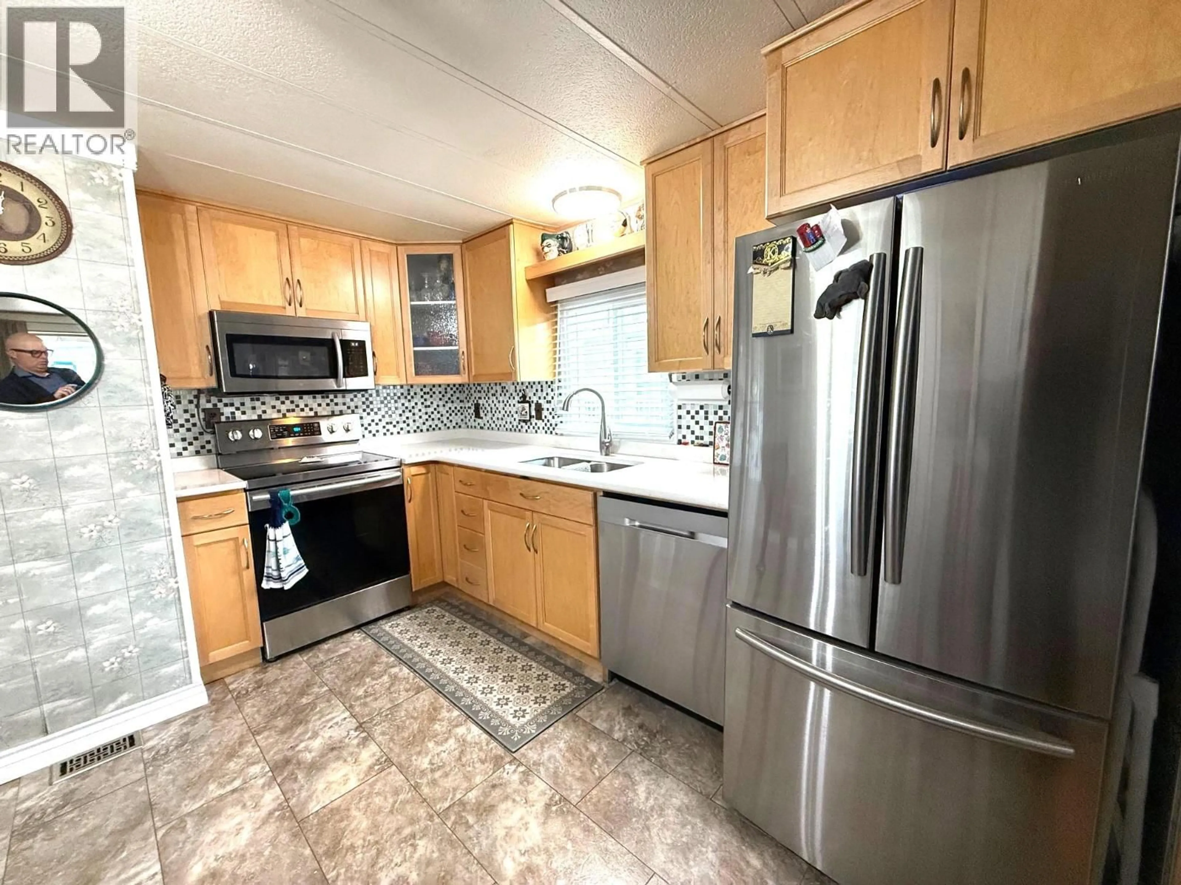 Standard kitchen, ceramic/tile floor for 40 - 8712 STEUART STREET, Summerland British Columbia V0H1Z1