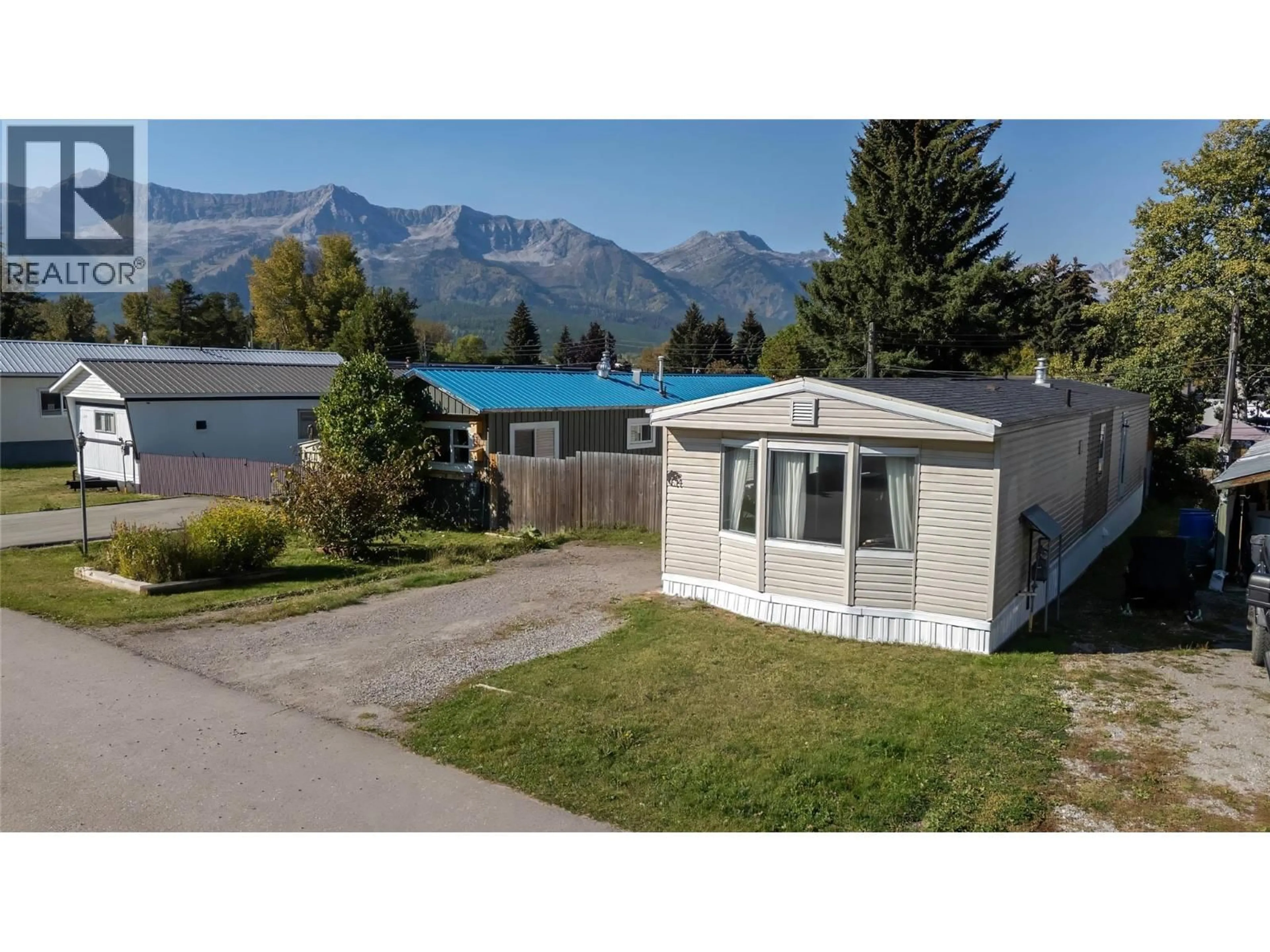 A pic from outside/outdoor area/front of a property/back of a property/a pic from drone, mountain view for E14 - 60 COKATO ROAD, Fernie British Columbia V0B1M4