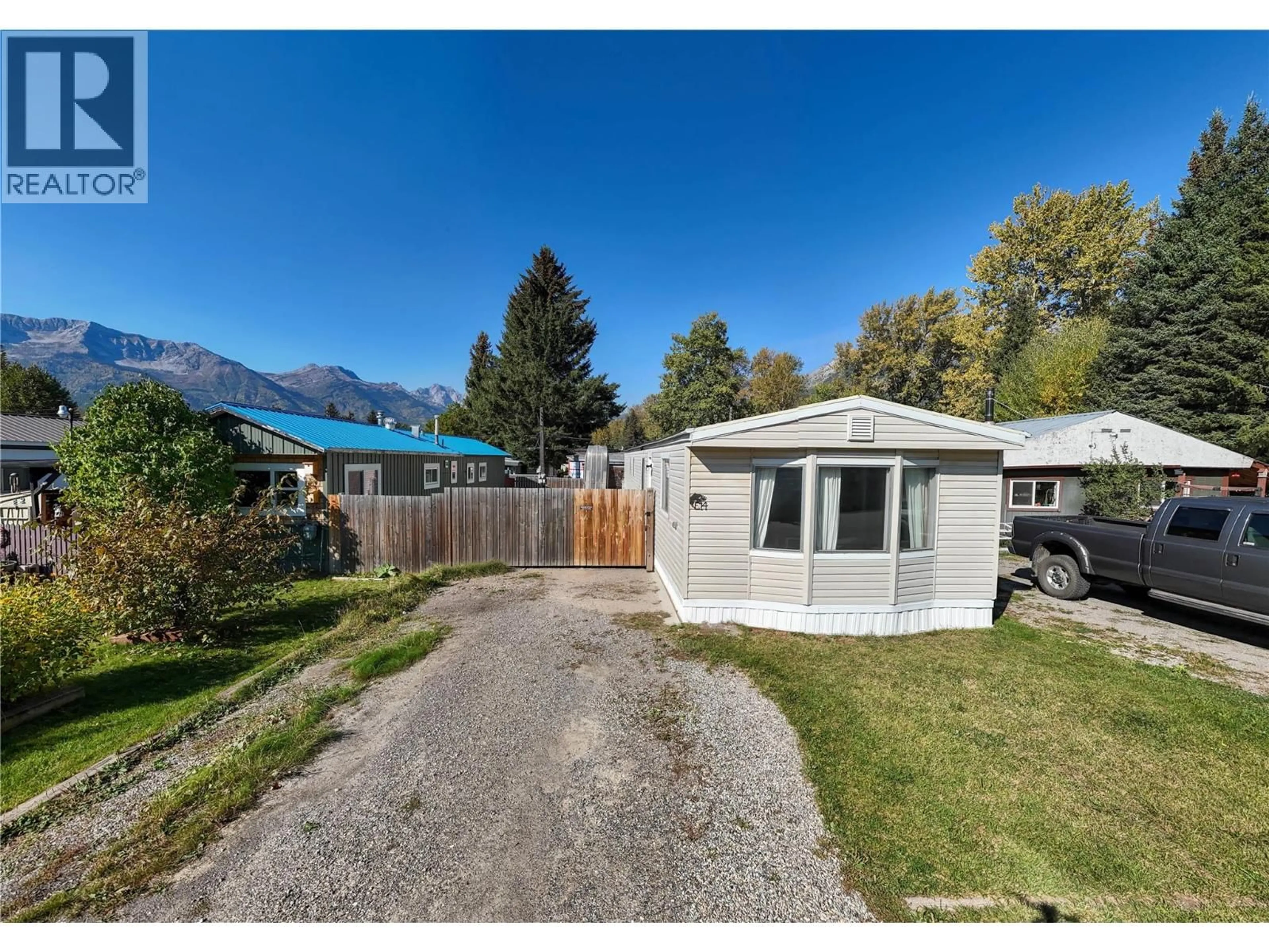 A pic from outside/outdoor area/front of a property/back of a property/a pic from drone, mountain view for E14 - 60 COKATO ROAD, Fernie British Columbia V0B1M4