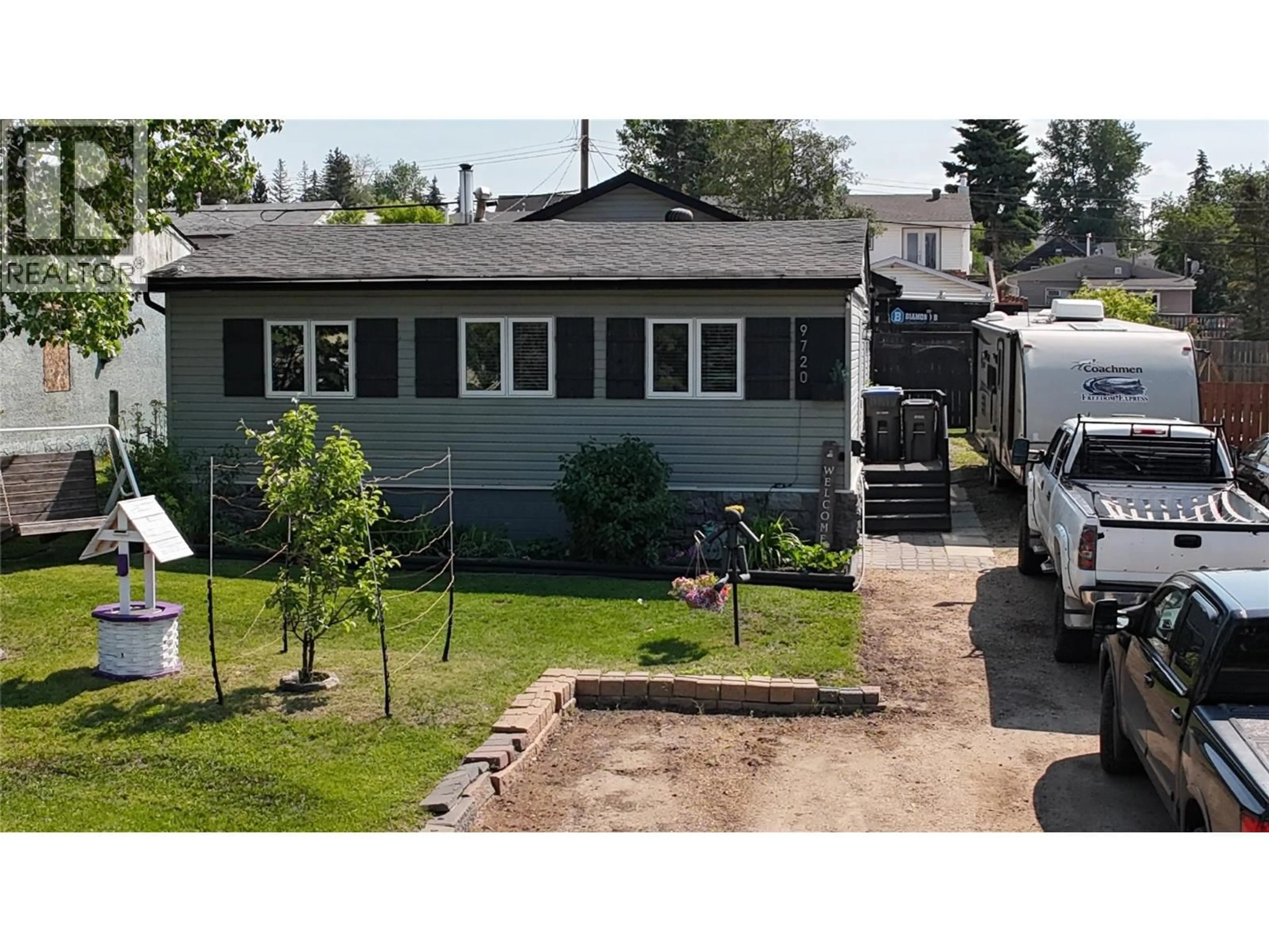 Home with vinyl exterior material, street for 9720 9 STREET, Dawson Creek British Columbia V1G3S6