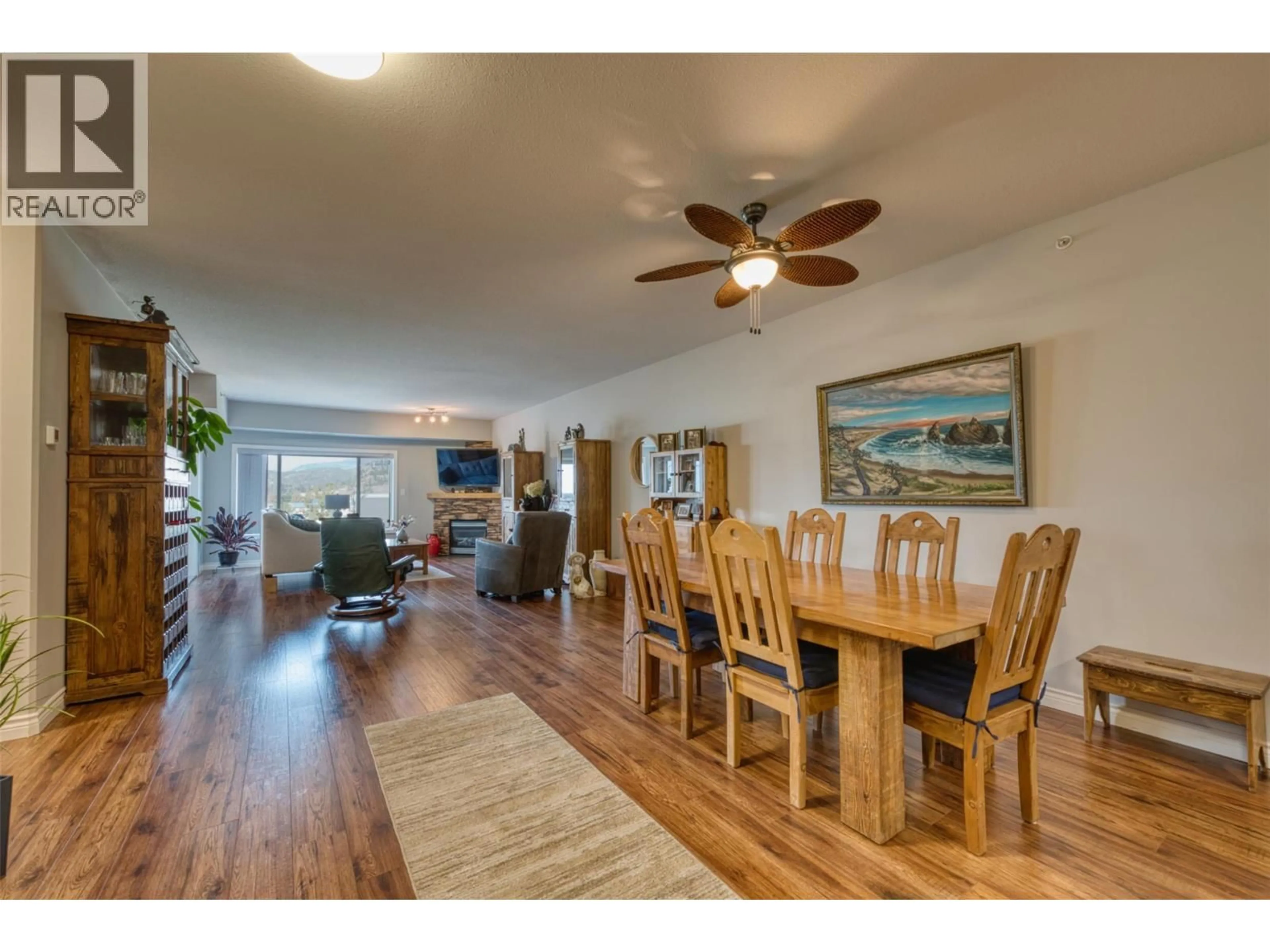 Dining room, wood/laminate floor for 413 - 1961 DURNIN ROAD, Kelowna British Columbia V1X7K6