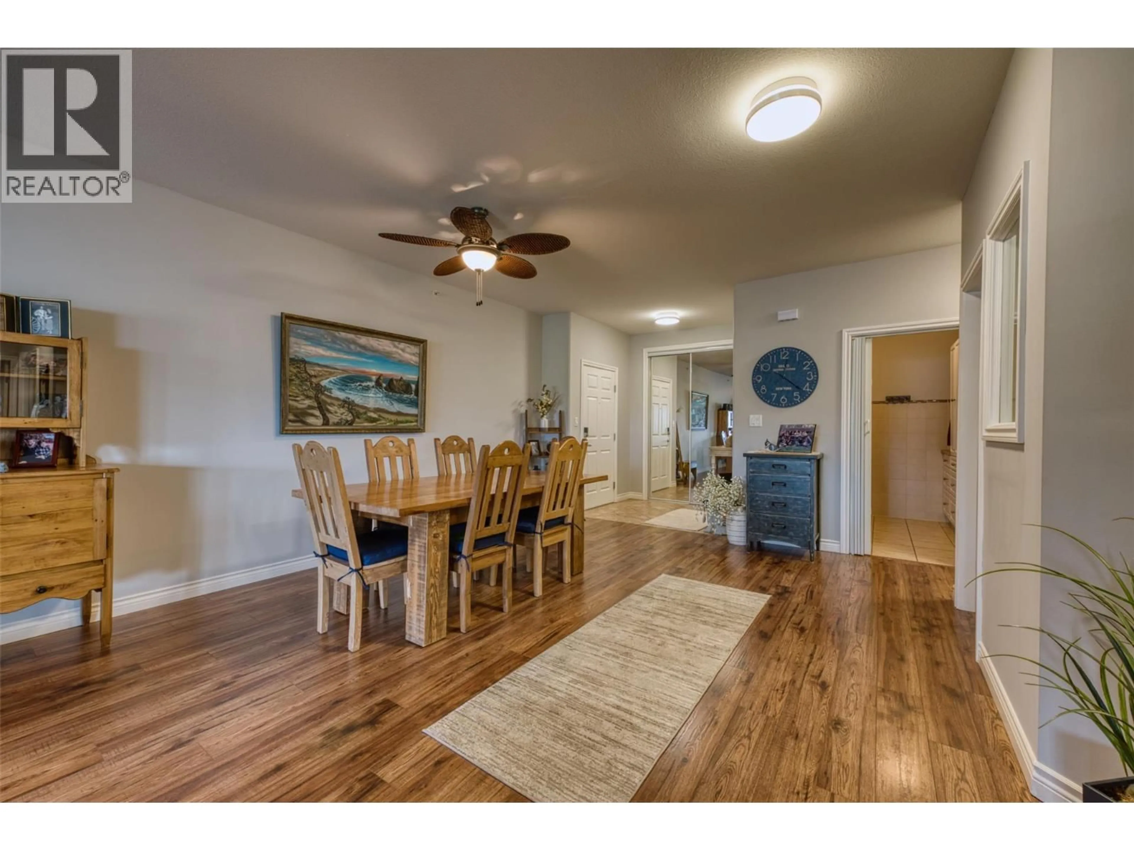 Dining room, wood/laminate floor for 413 - 1961 DURNIN ROAD, Kelowna British Columbia V1X7K6