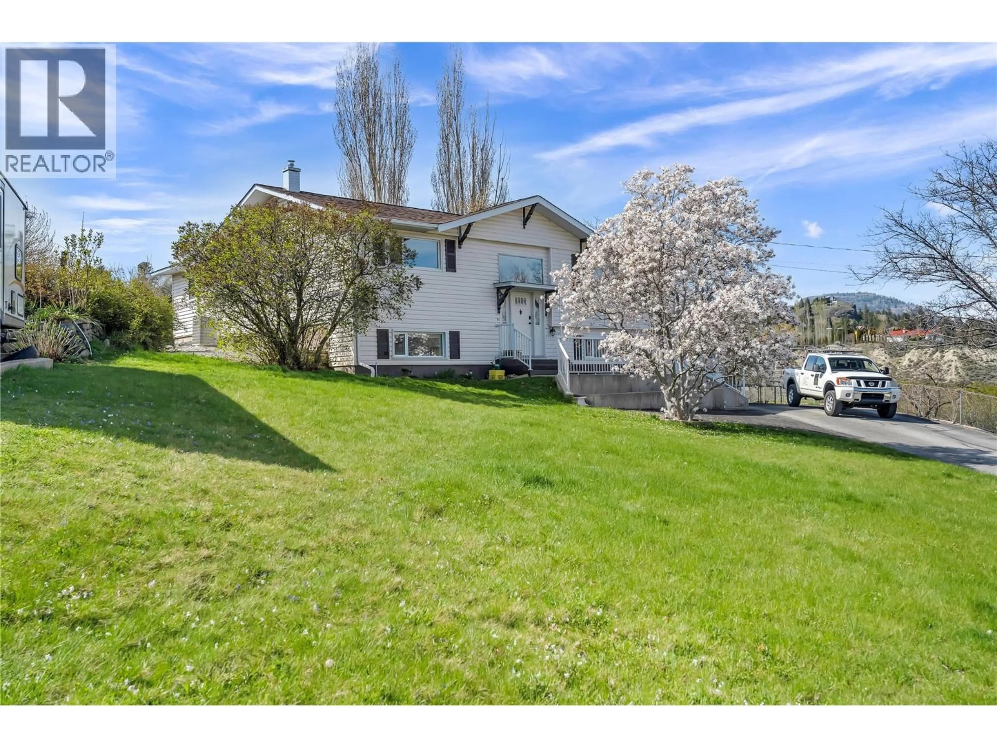 A pic from outside/outdoor area/front of a property/back of a property/a pic from drone, unknown for 6528 LIPSETT CRESCENT, Summerland British Columbia V0H1Z1