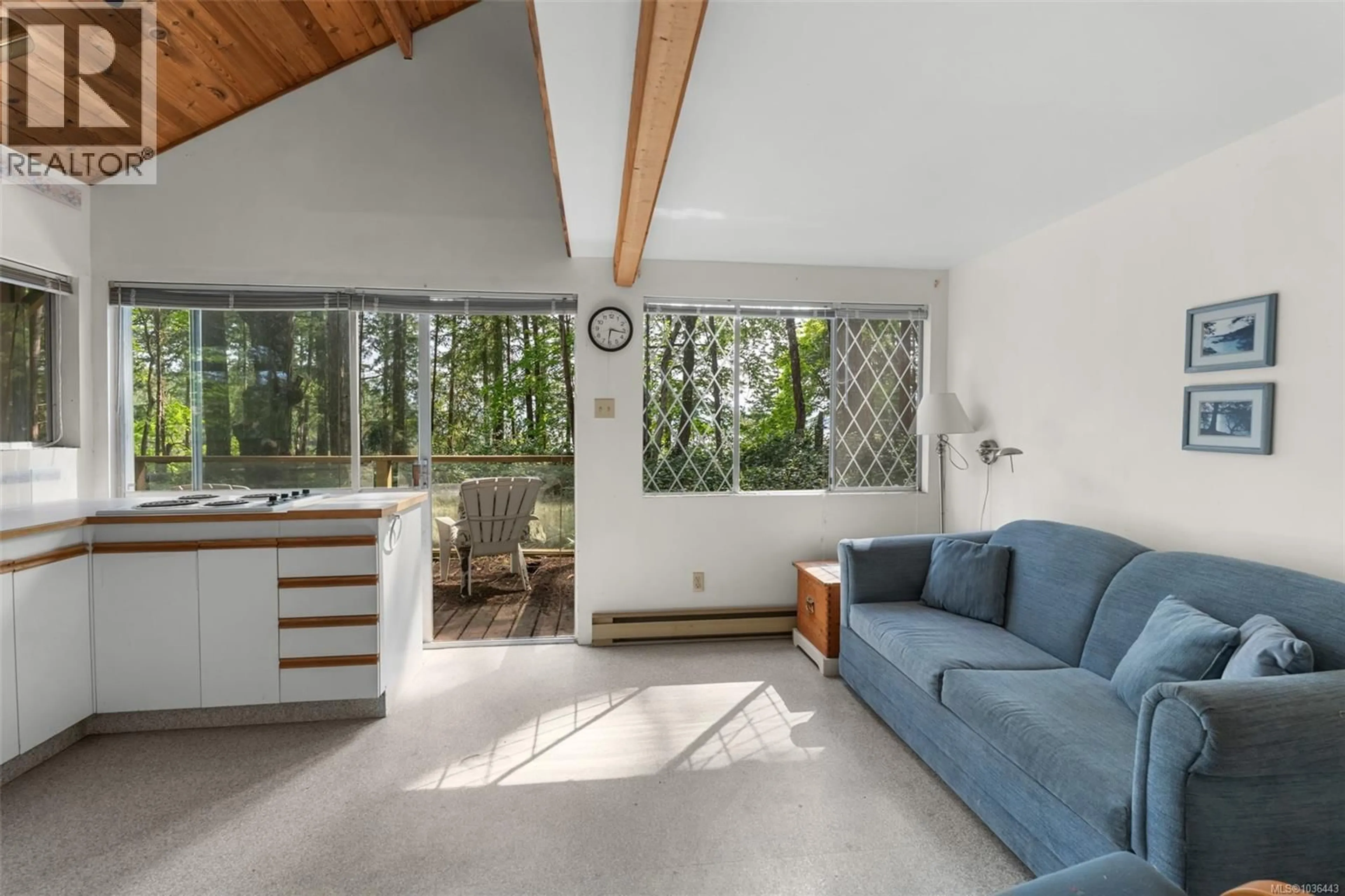 Living room with furniture, unknown for 1085 SEA FERN LANE, Mudge Island British Columbia V0R1X6