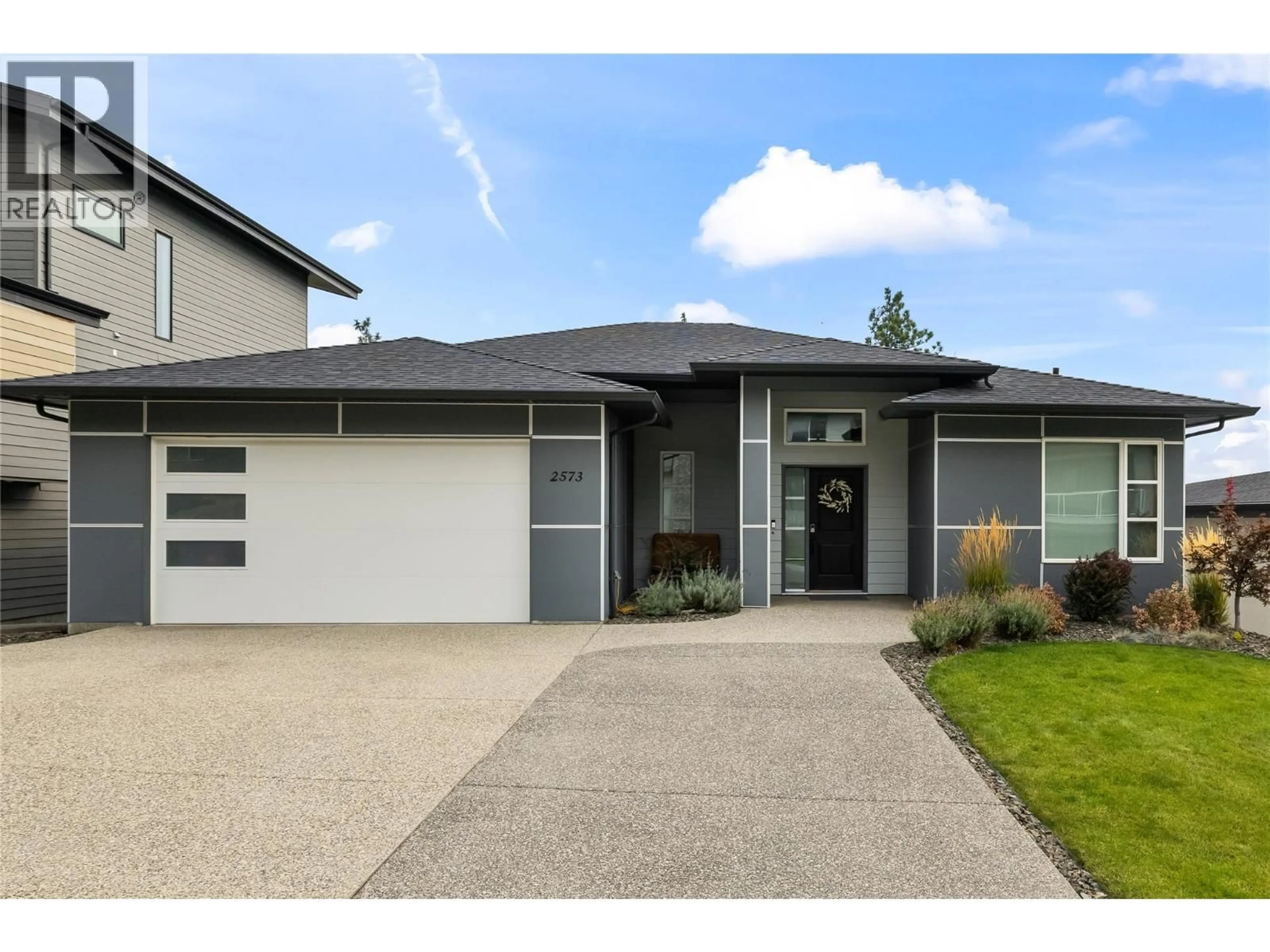 Home with vinyl exterior material, street for 2573 CROWN CREST DRIVE, West Kelowna British Columbia V4T3N3
