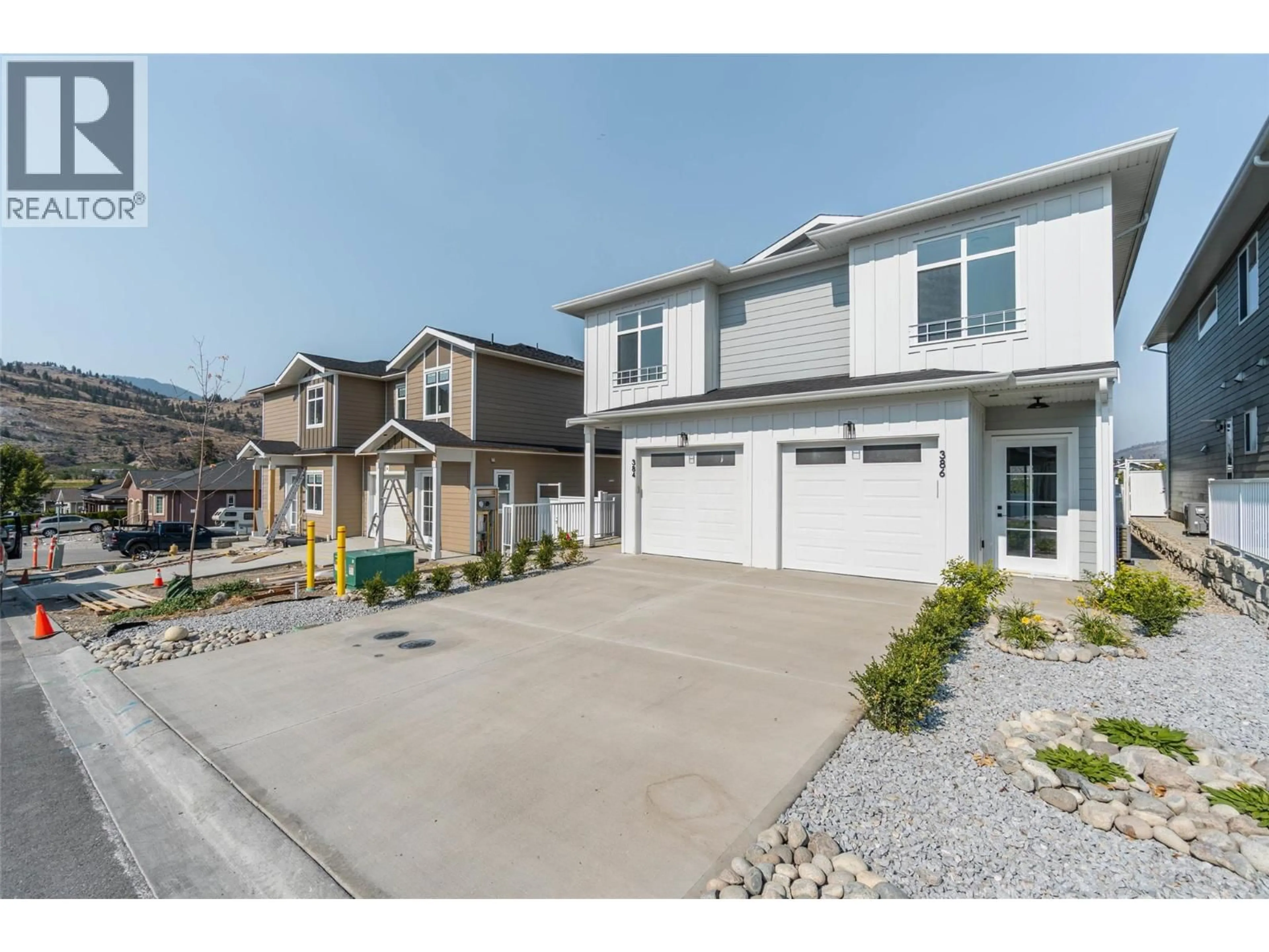 A pic from outside/outdoor area/front of a property/back of a property/a pic from drone, street for 384 CHARDONNAY AVENUE, Oliver British Columbia V0H1T4