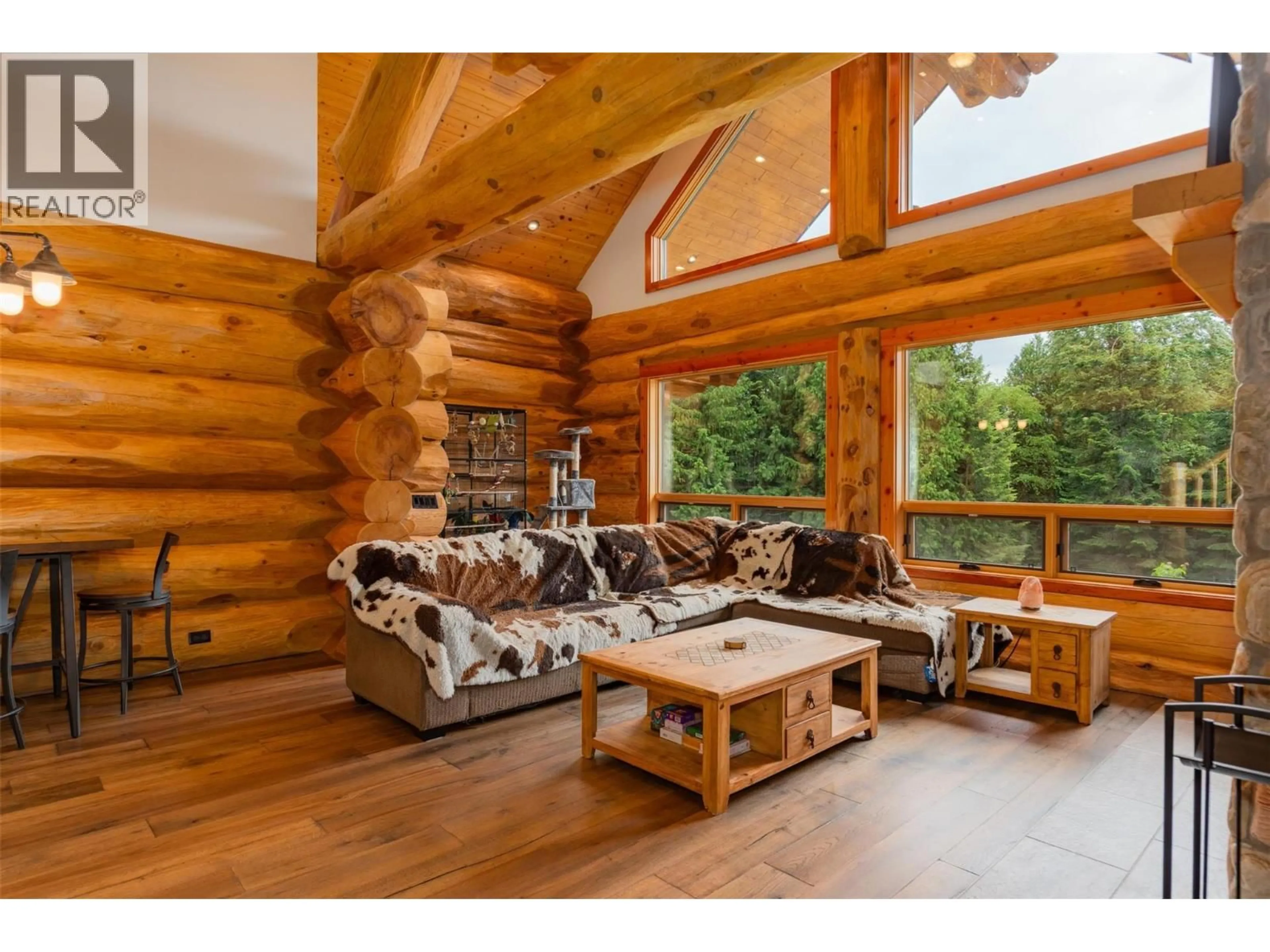Living room with furniture, wood/laminate floor for 800 HIGHWAY 22 OTHER, Rossland British Columbia V0G1Y0