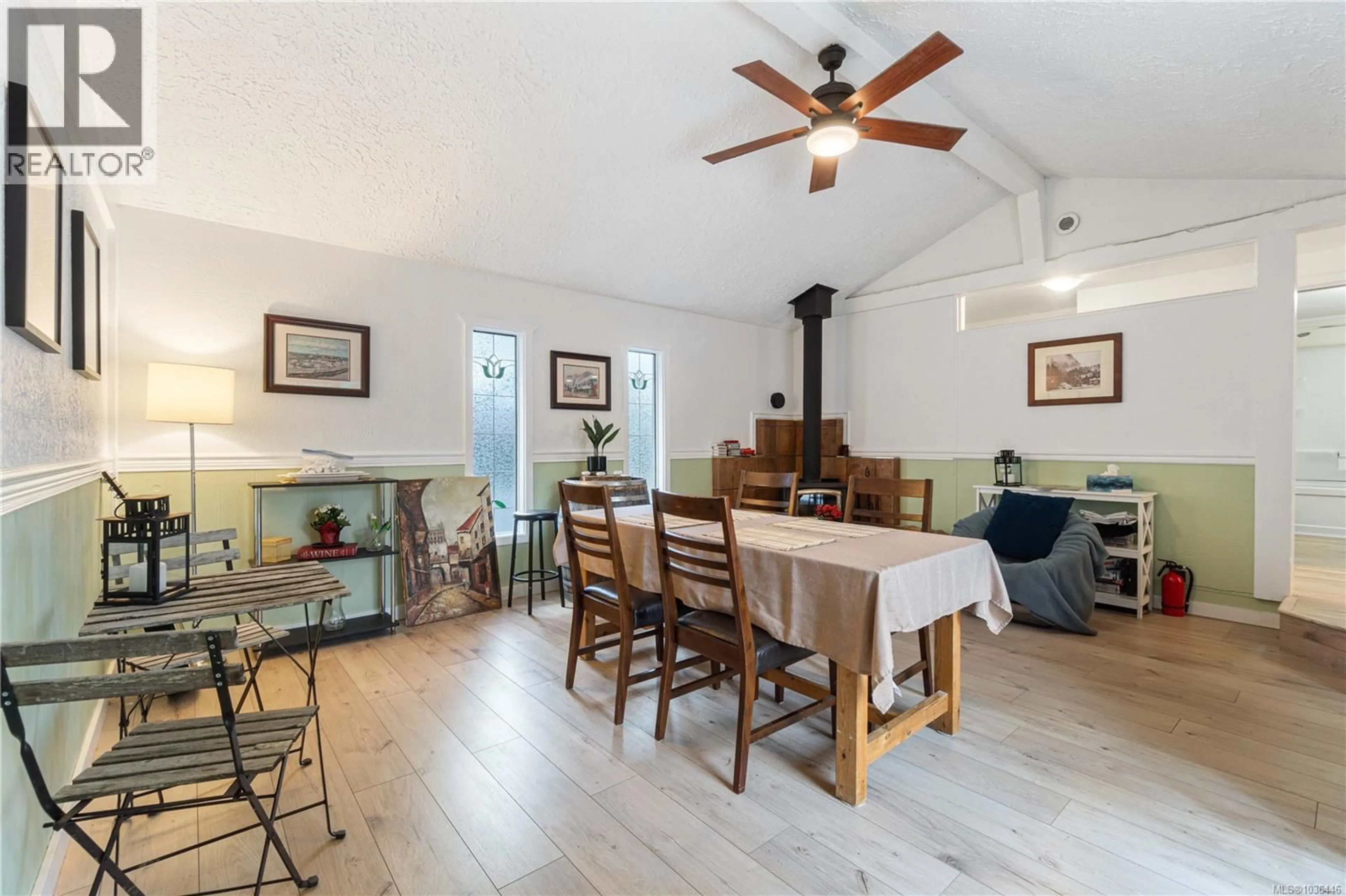 Dining room, wood/laminate floor for 3872 ISLAND HIGHWAY WEST, Qualicum Beach British Columbia V9K2G9