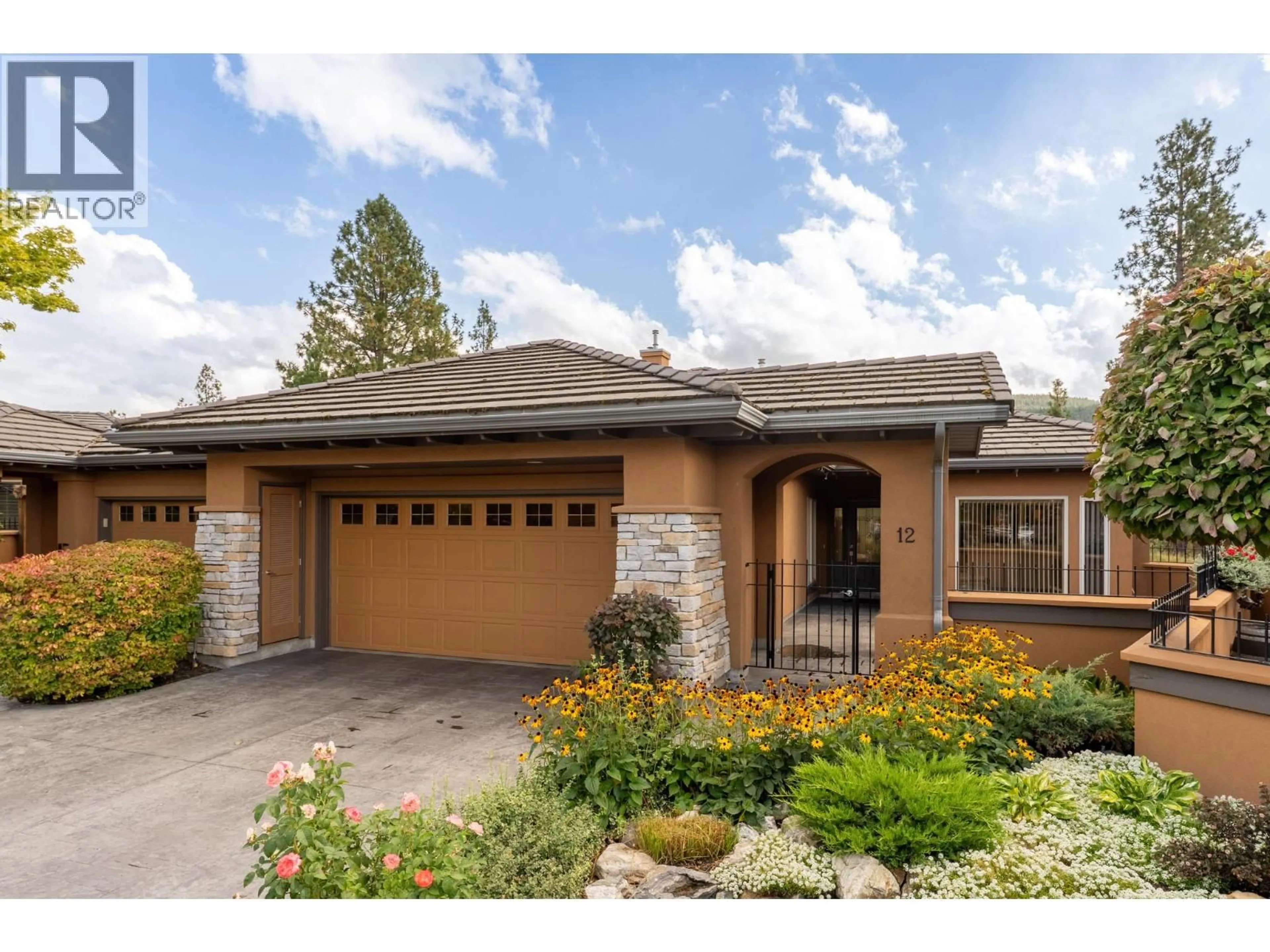 Home with brick exterior material, street for 12 - 4100 GALLAGHERS PARKLAND DRIVE, Kelowna British Columbia V1W3Z8
