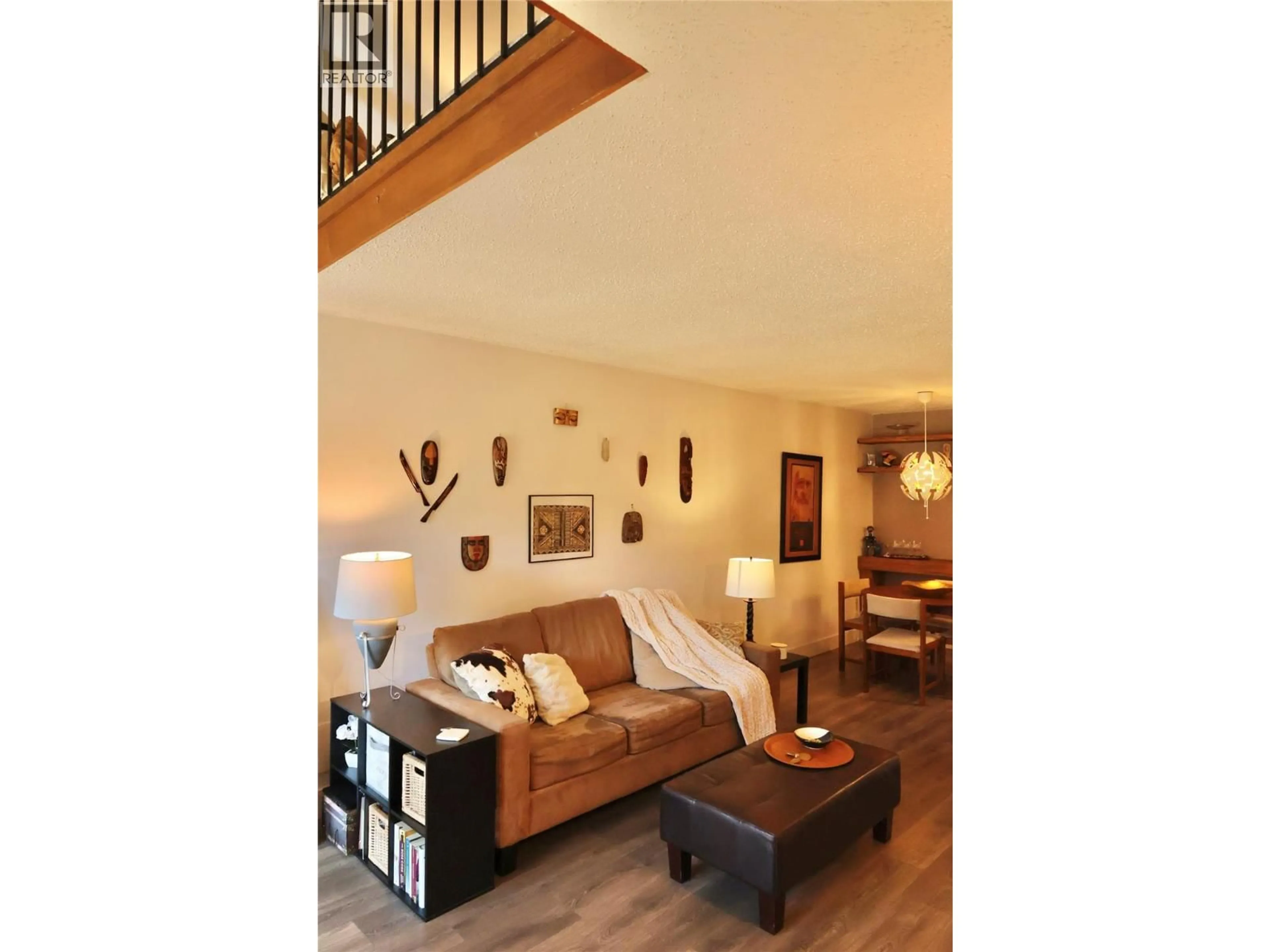 Living room with furniture, wood/laminate floor for 318 - 3140 WILSON STREET, Penticton British Columbia V2A7K4