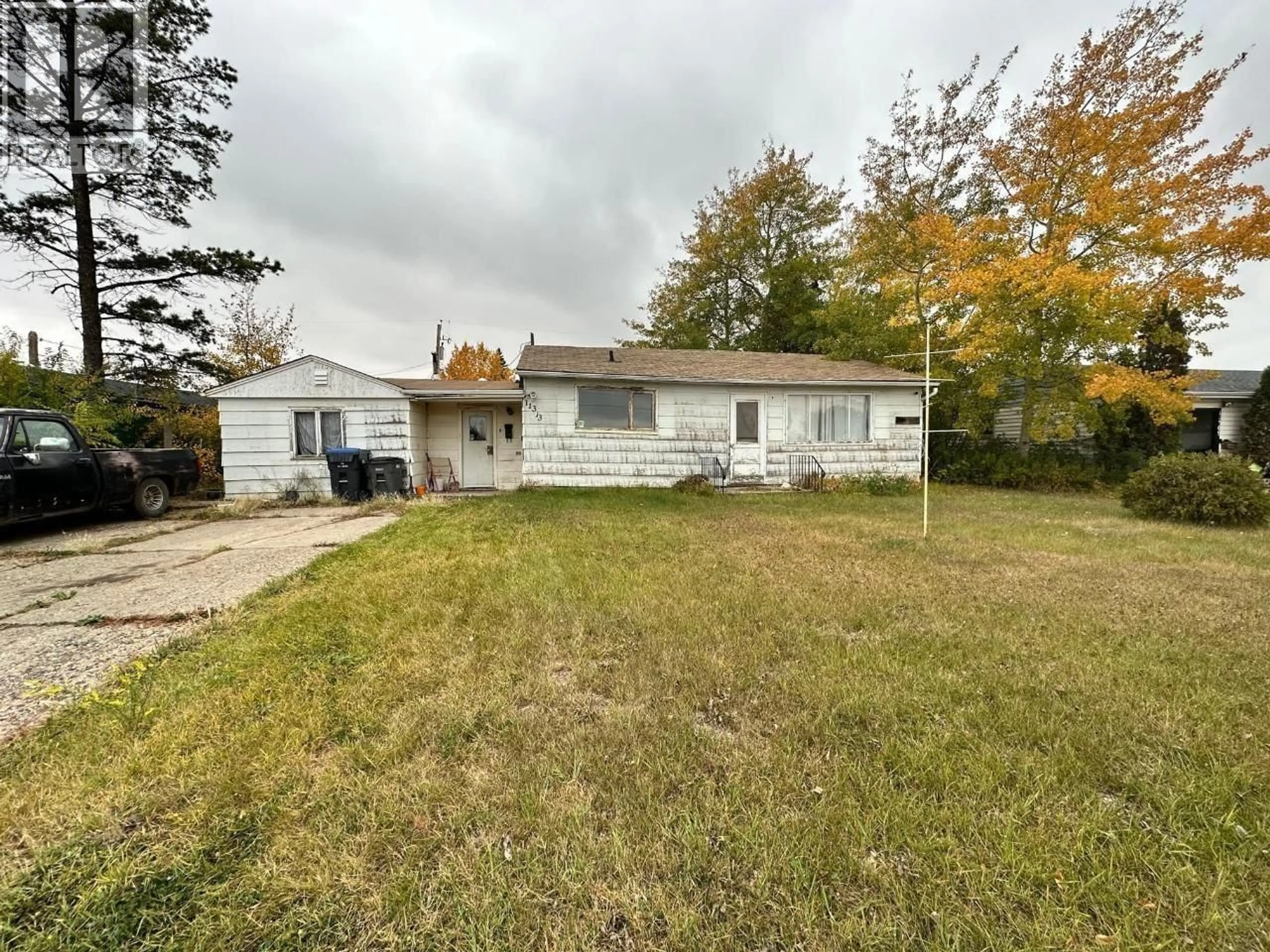 A pic from outside/outdoor area/front of a property/back of a property/a pic from drone, street for 11313 13 STREET, Dawson Creek British Columbia V1G3X1