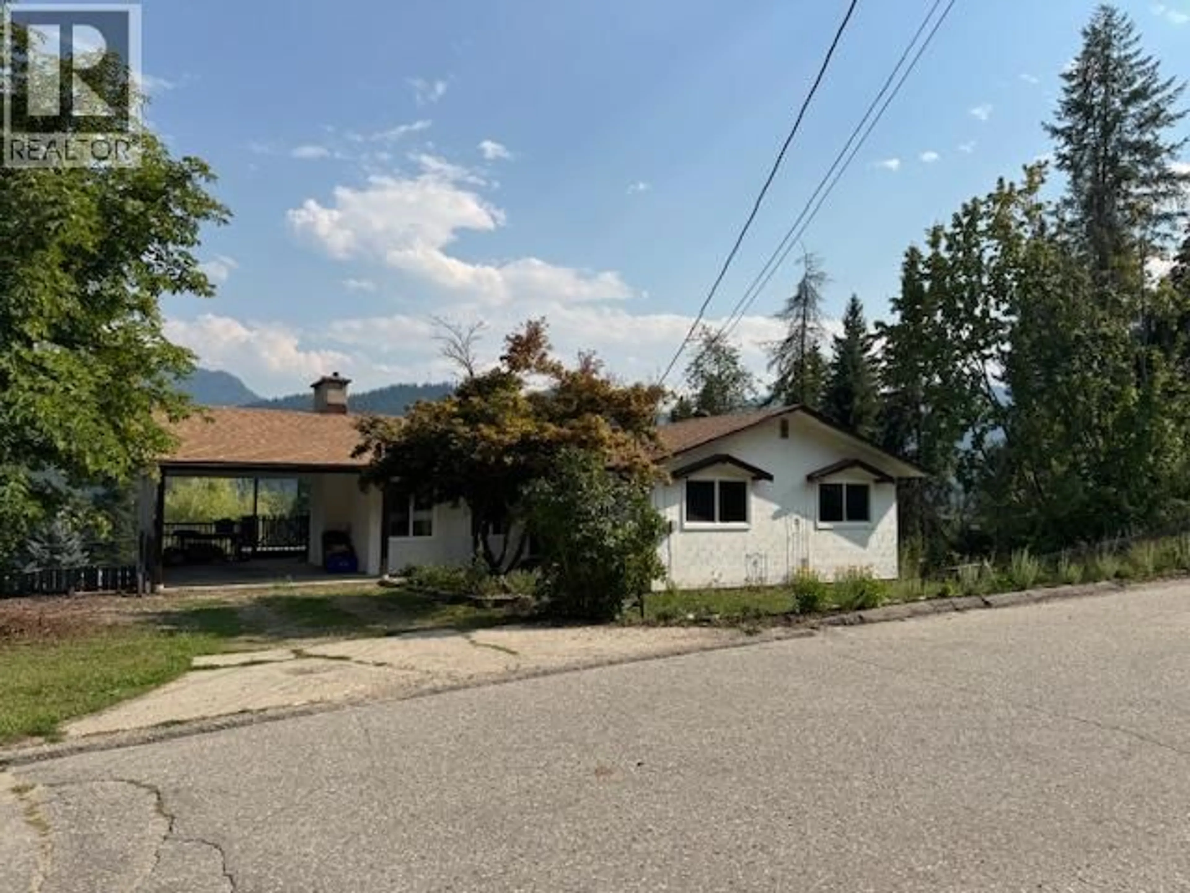 A pic from outside/outdoor area/front of a property/back of a property/a pic from drone, street for 1778 SECOND STREET, Fruitvale British Columbia V0G1L0