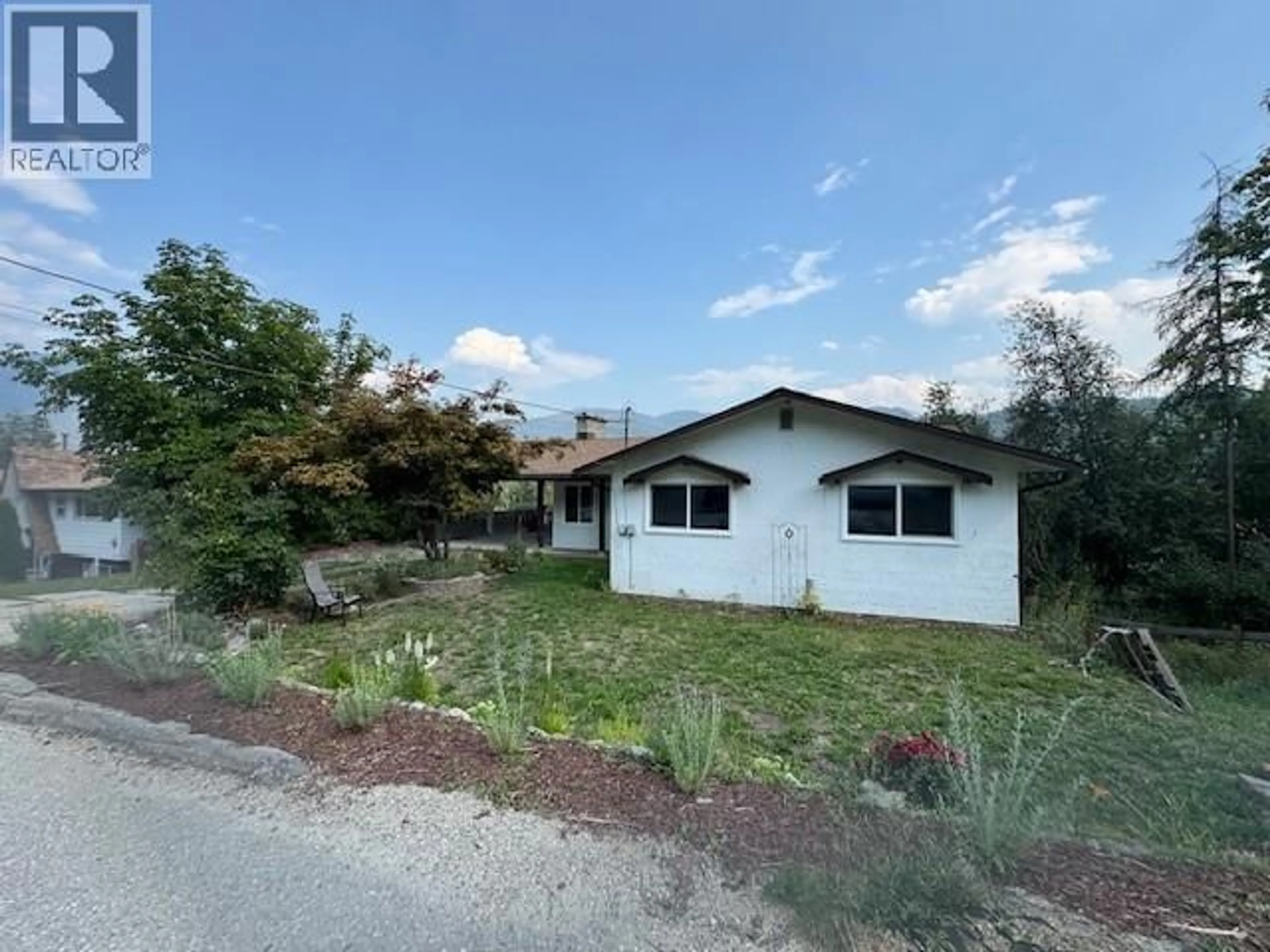 A pic from outside/outdoor area/front of a property/back of a property/a pic from drone, street for 1778 SECOND STREET, Fruitvale British Columbia V0G1L0