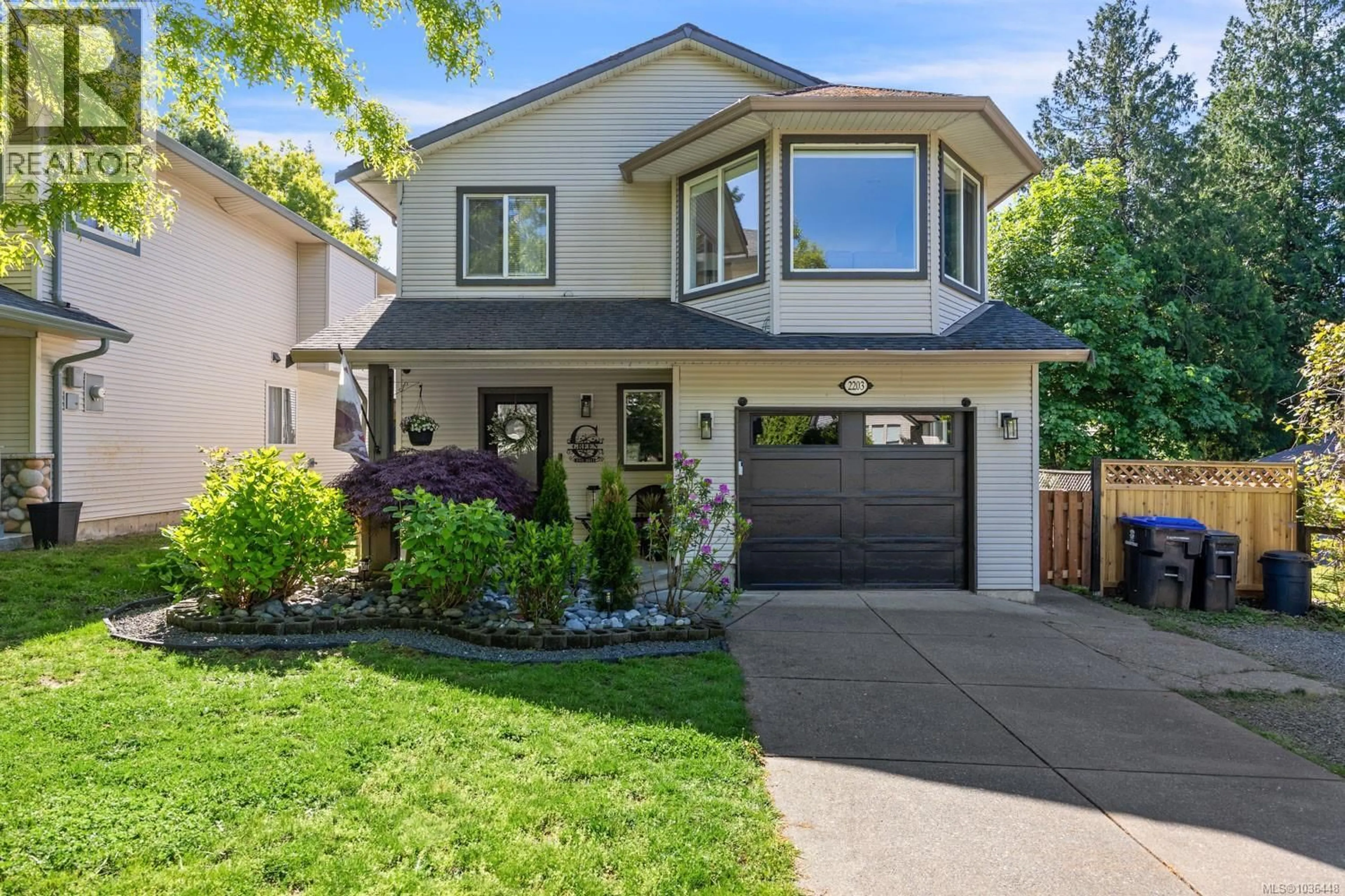 Home with vinyl exterior material, street for 2203 TAMARACK DRIVE, Courtenay British Columbia V9N9C1