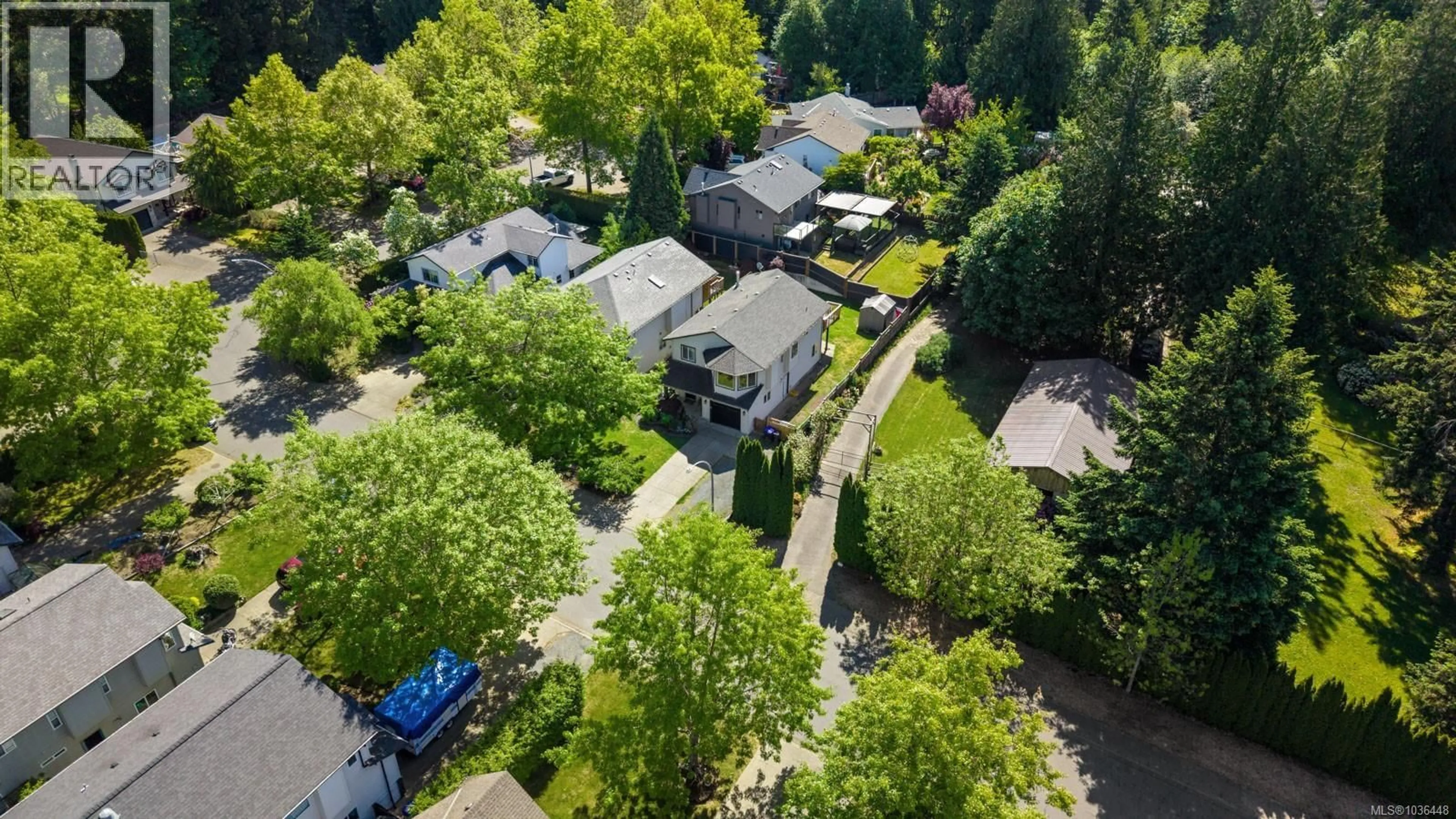 A pic from outside/outdoor area/front of a property/back of a property/a pic from drone, forest/trees view for 2203 TAMARACK DRIVE, Courtenay British Columbia V9N9C1