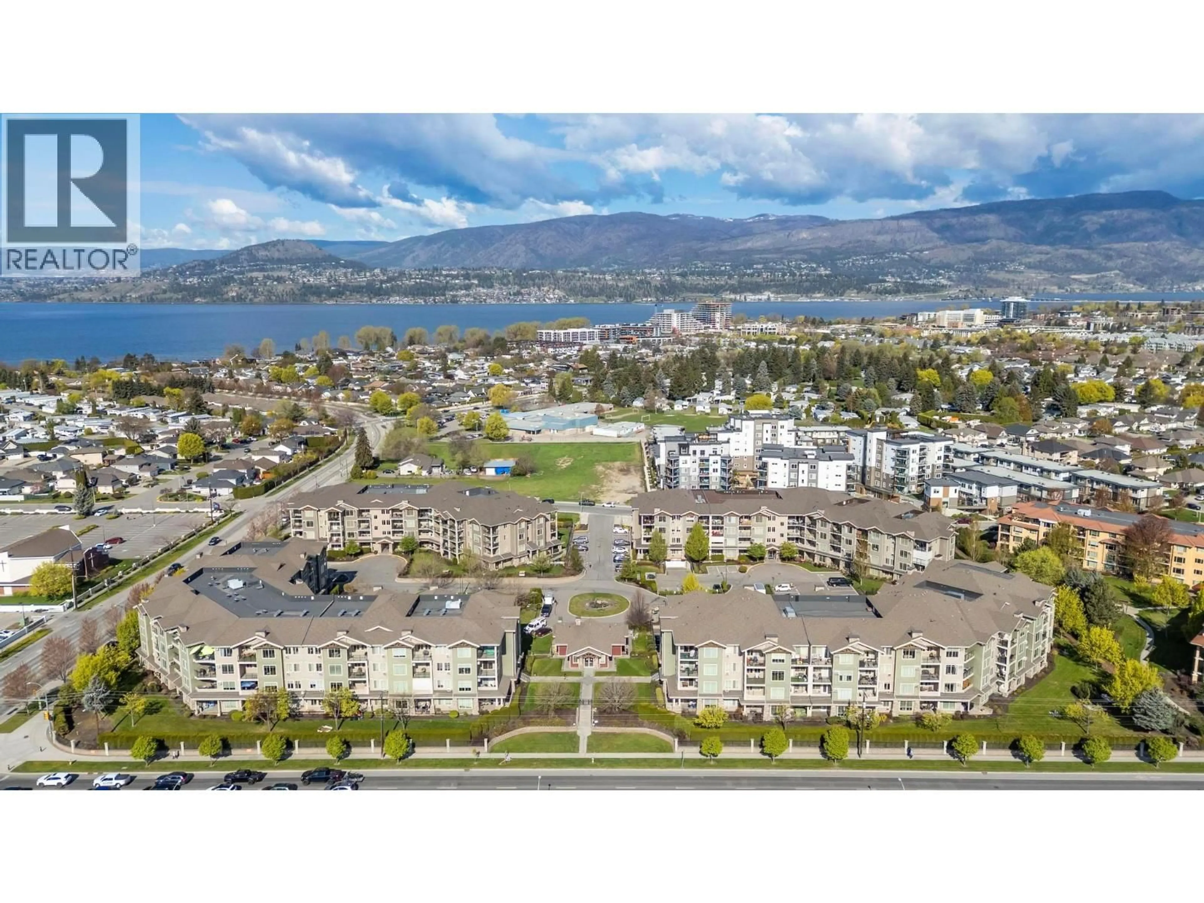 A pic from outside/outdoor area/front of a property/back of a property/a pic from drone, water/lake/river/ocean view for 205 - 3735 CASORSO ROAD, Kelowna British Columbia V1W5G1