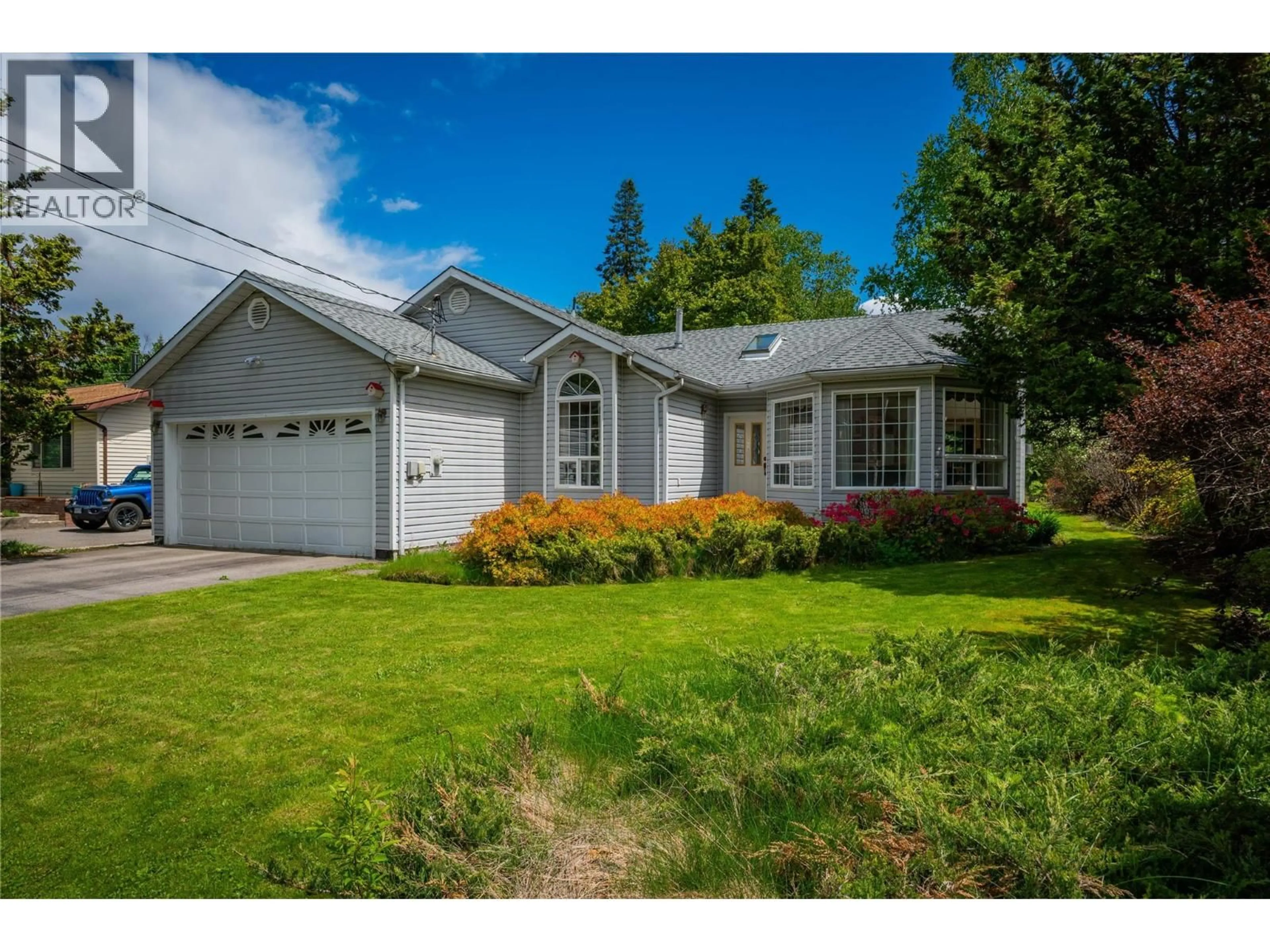 Home with vinyl exterior material, street for 2718 FIR DRIVE, South Slocan British Columbia V0G2G1